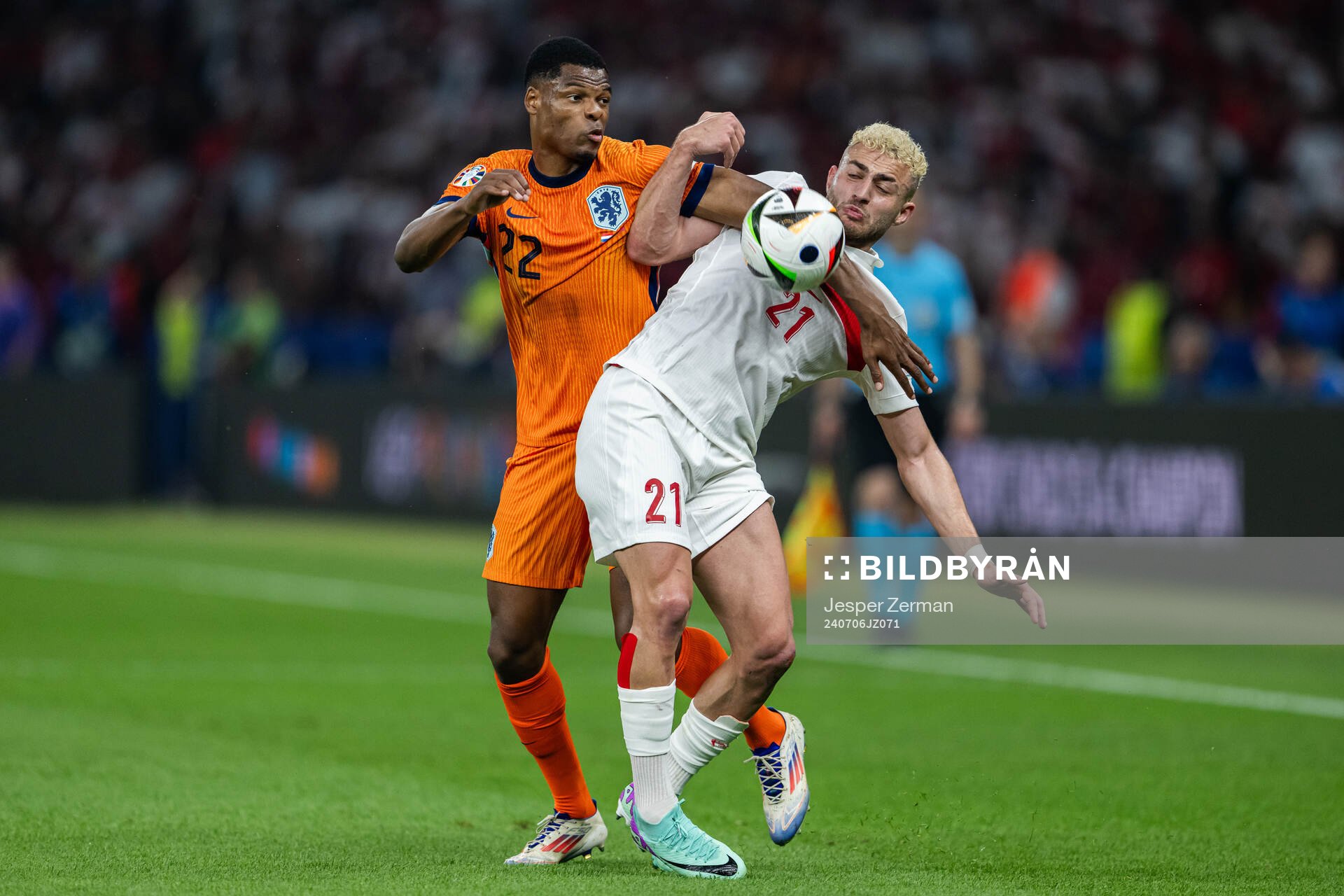 Denzel Dumfries of Netherlands and Baris Alper Yilmaz of Turkey during the UEFA Euro 2024 Football Championship quarterfinal between Netherlands and Turkey on July 6, 2024 in Berlin.