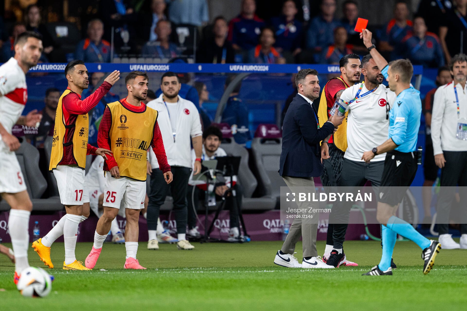 Referee Clement Turpin shows a red card
