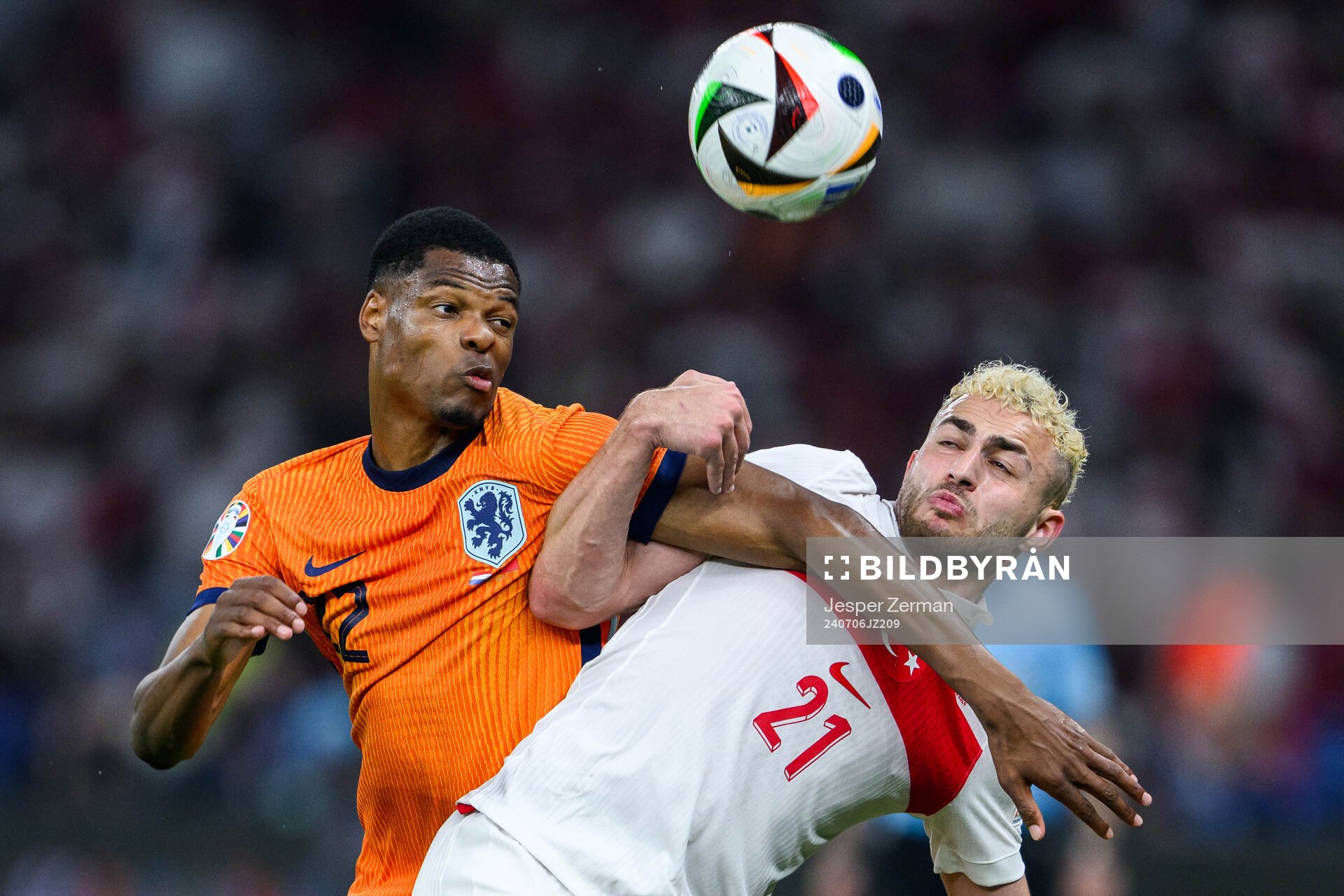 Denzel Dumfries of Netherlands and Baris Alper Yilmaz of