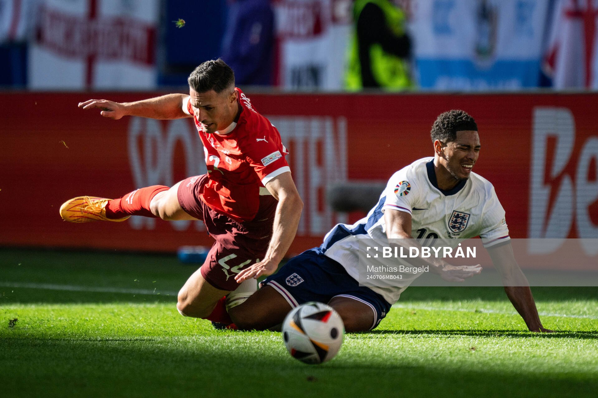 Fabian Schär of Switzerland and Jude Bellingham of England