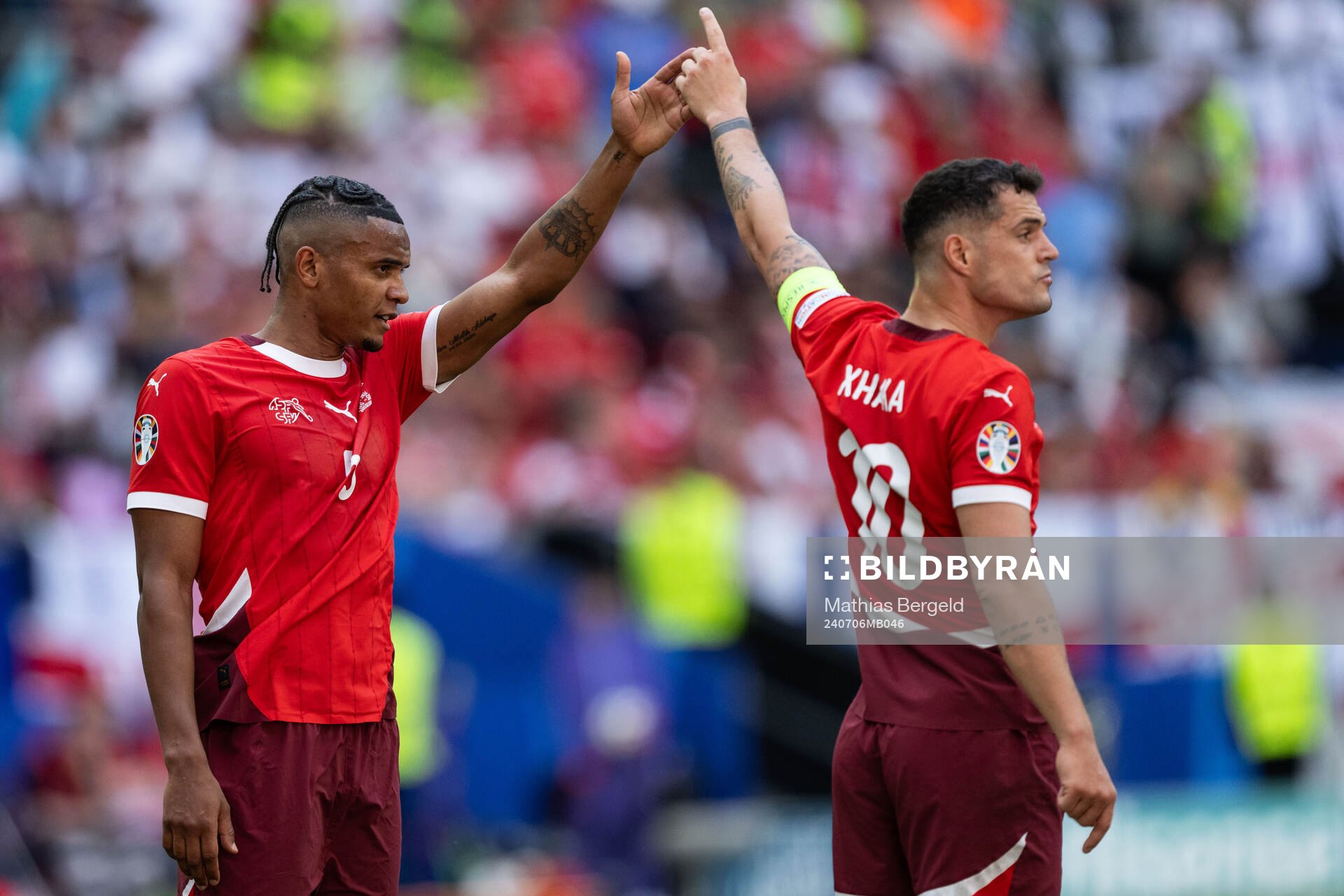 Manuel Akanji and Granit Xhaka of Switzerland
