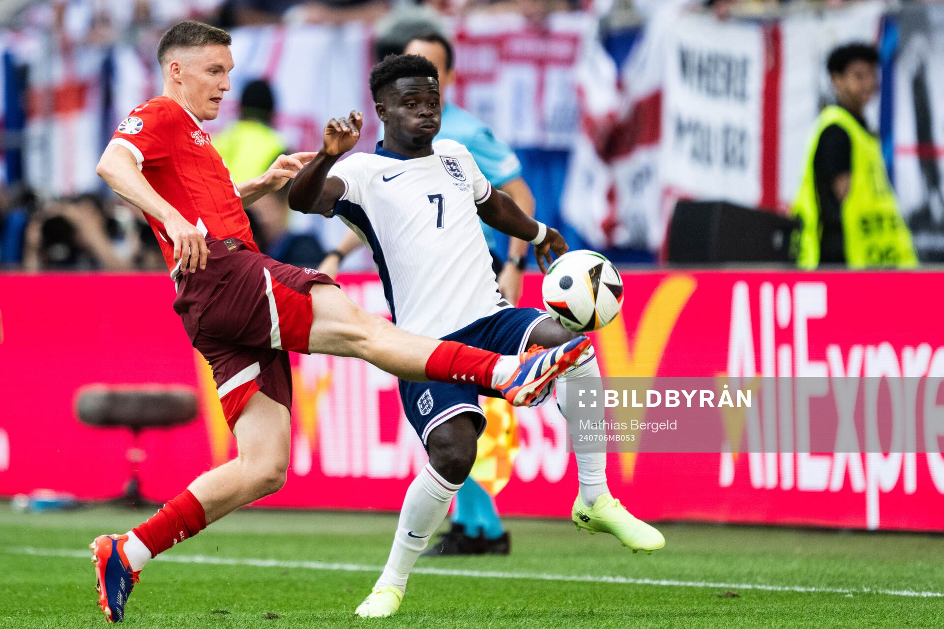 Michel Aebischer of Switzerland and Bukayo Saka of England during the UEFA Euro 2024 Football Championship quarterfinal between England and Switzerland on July 6, 2024 in Düsseldorf.