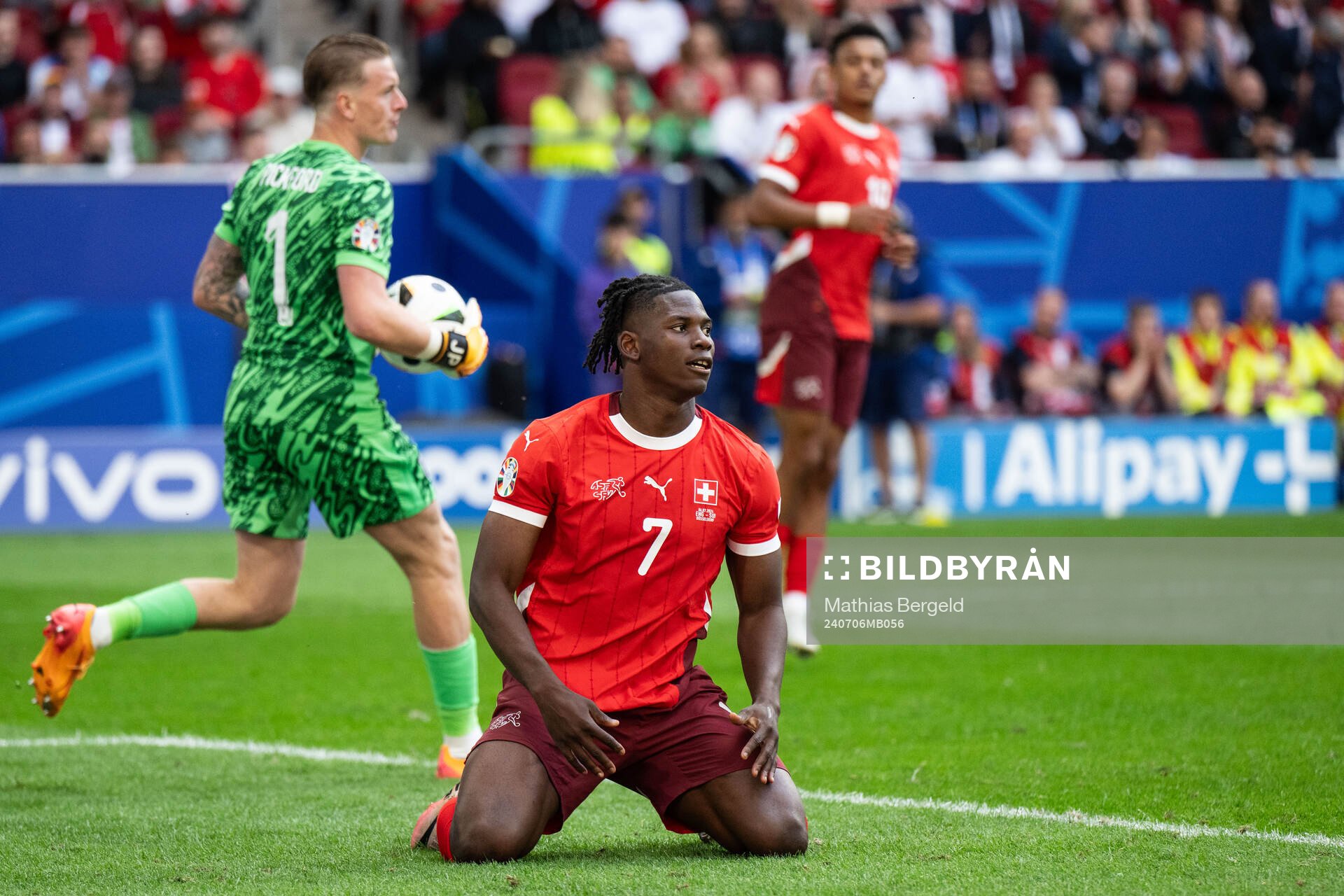Breel Embolo of Switzerland looks dejected