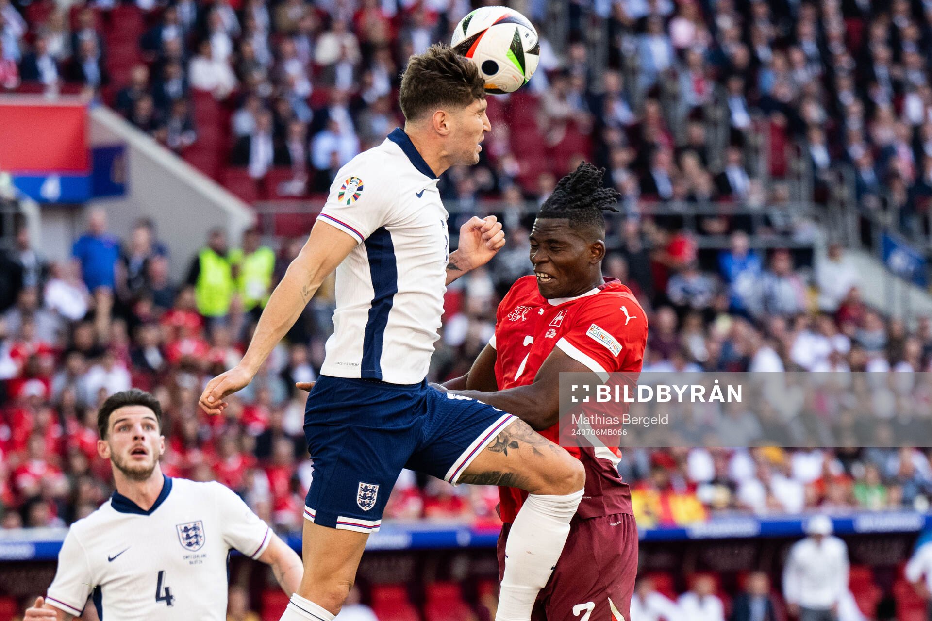 John Stones of England and Breel Embolo of Switzerland