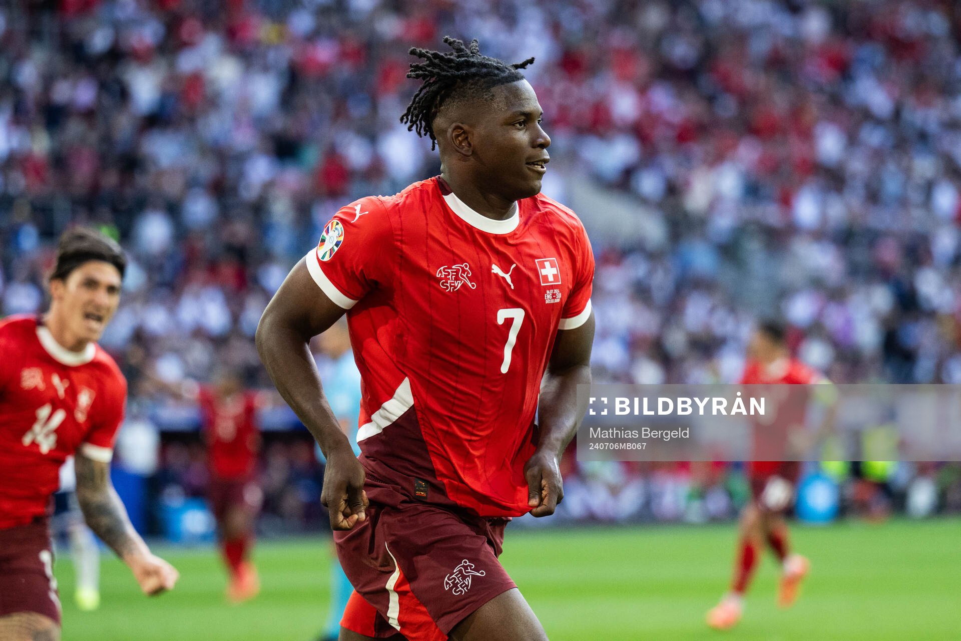 Breel Embolo of Switzerland celebrates