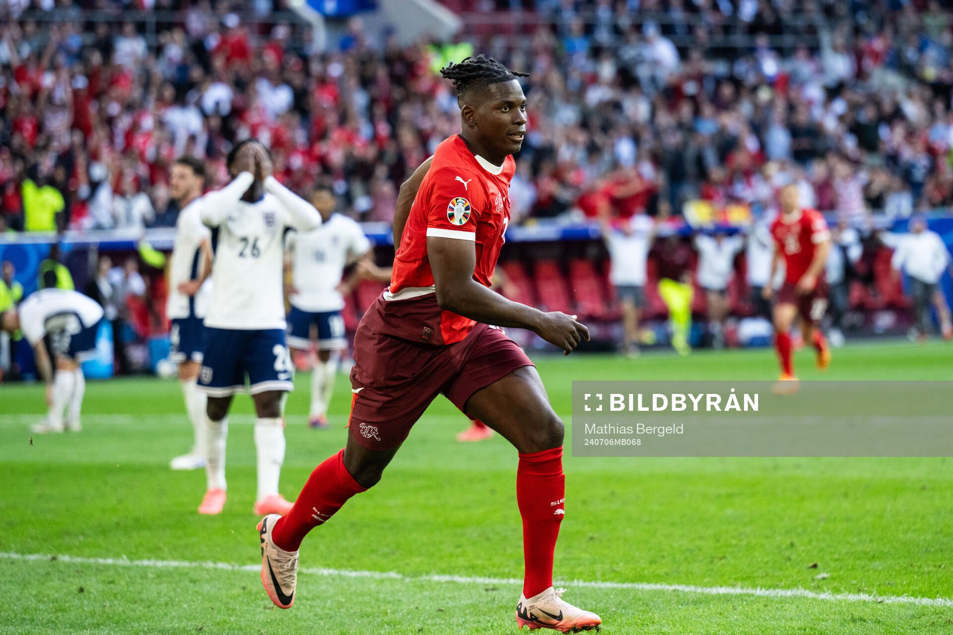 Breel Embolo of Switzerland celebrates