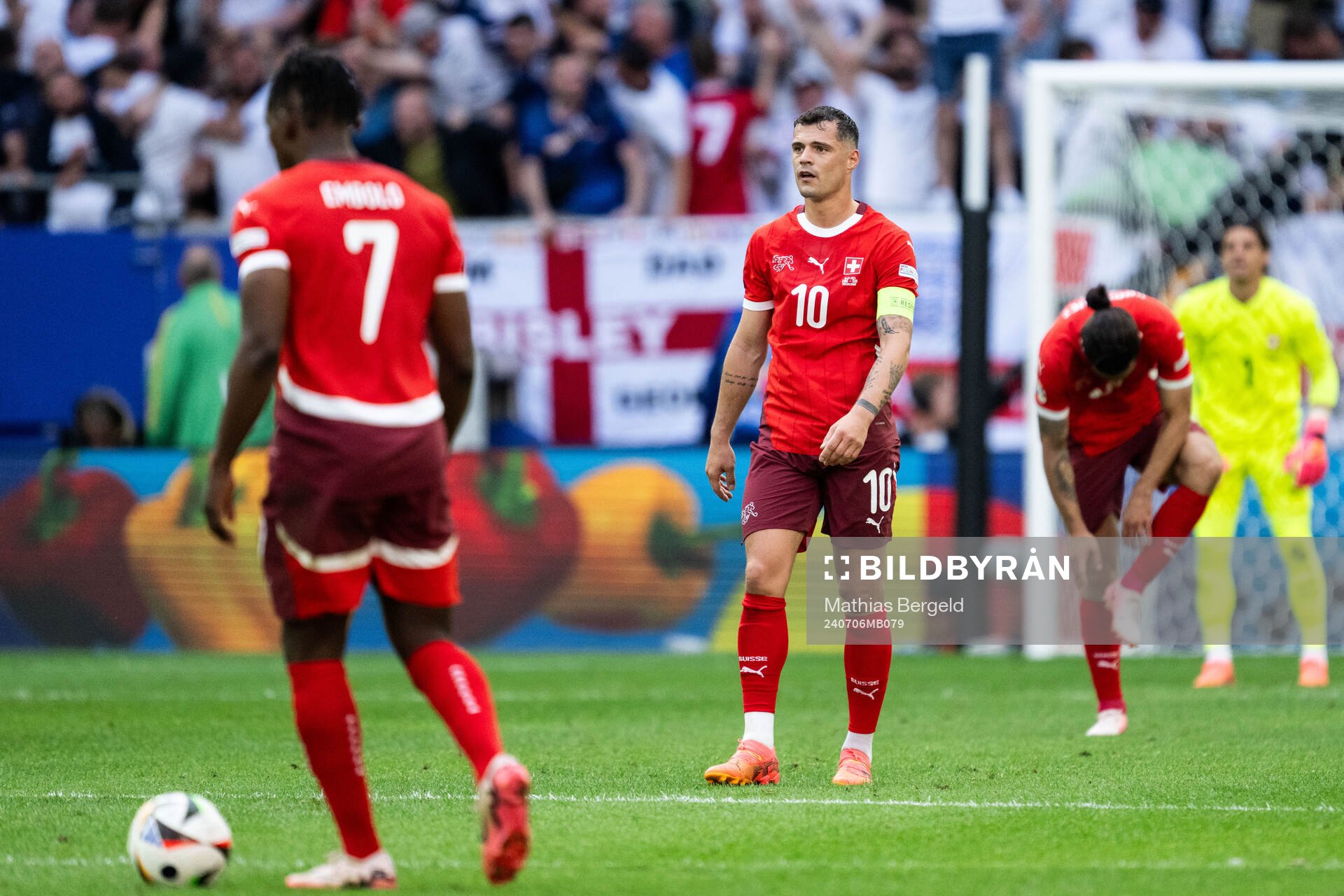 Granit Xhaka of Switzerland looks dejected