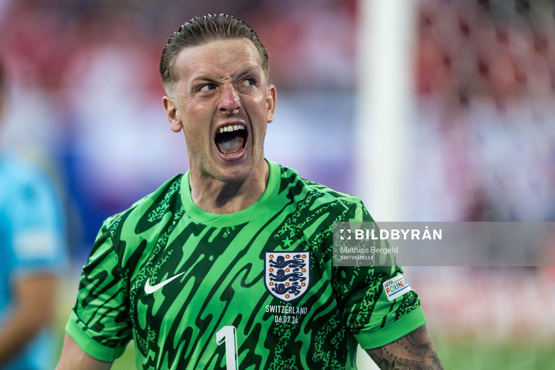 Goalkeeper Jordan Pickford of England celebrates