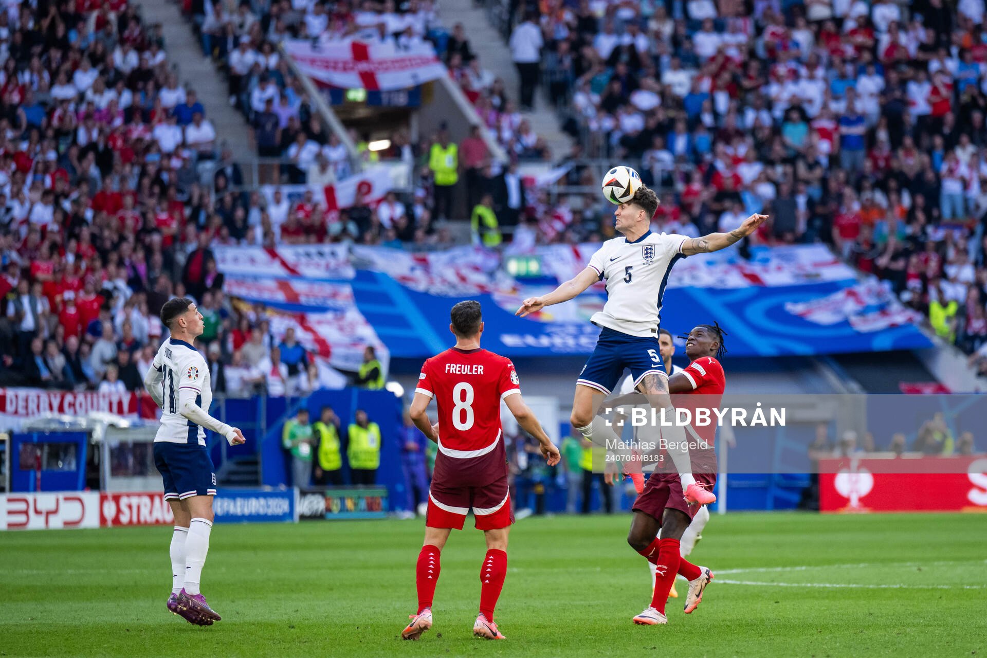 John Stones of England and Breel Embolo of Switzerland