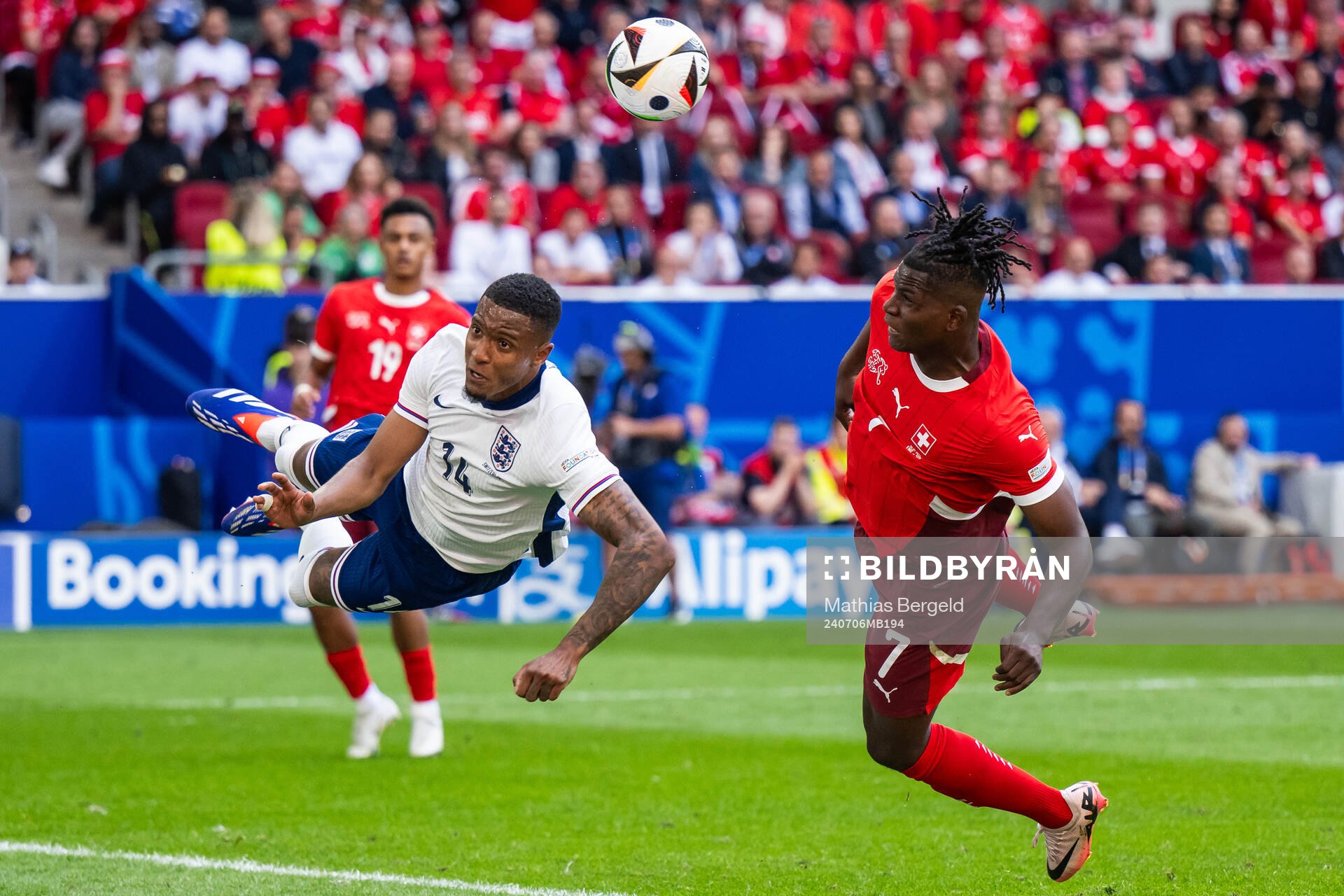 Ezri Konsa of England and Breel Embolo of Switzerland during the UEFA Euro 2024 Football Championship quarterfinal between England and Switzerland on July 6, 2024 in Düsseldorf. 