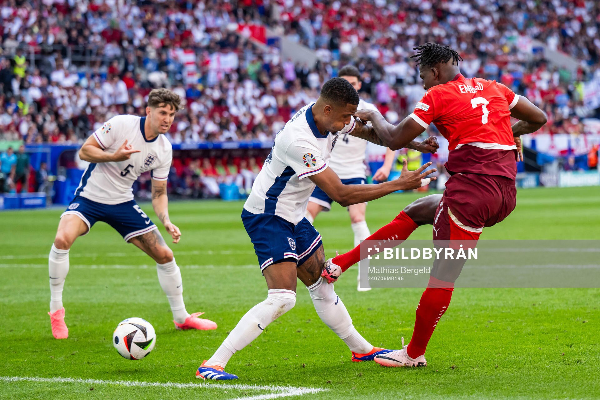 Ezri Konsa of England and Breel Embolo of Switzerland