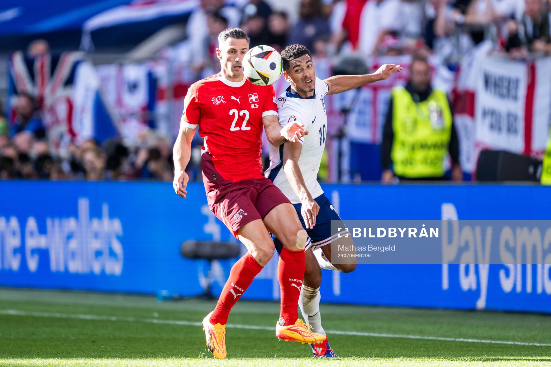 Fabian Schär of Switzerland and Jude Bellingham of England