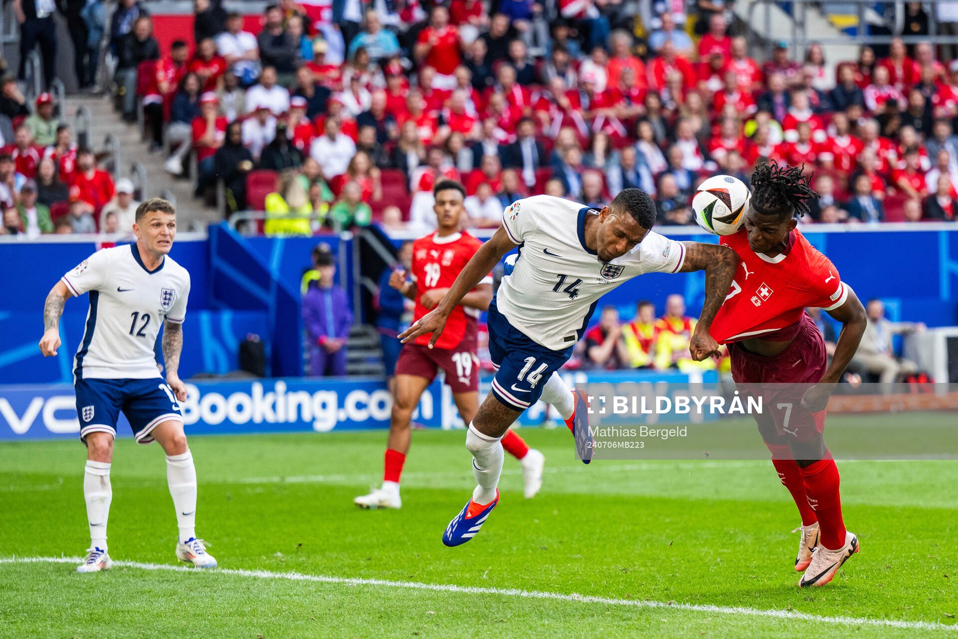 Ezri Konsa of England and Breel Embolo of Switzerland