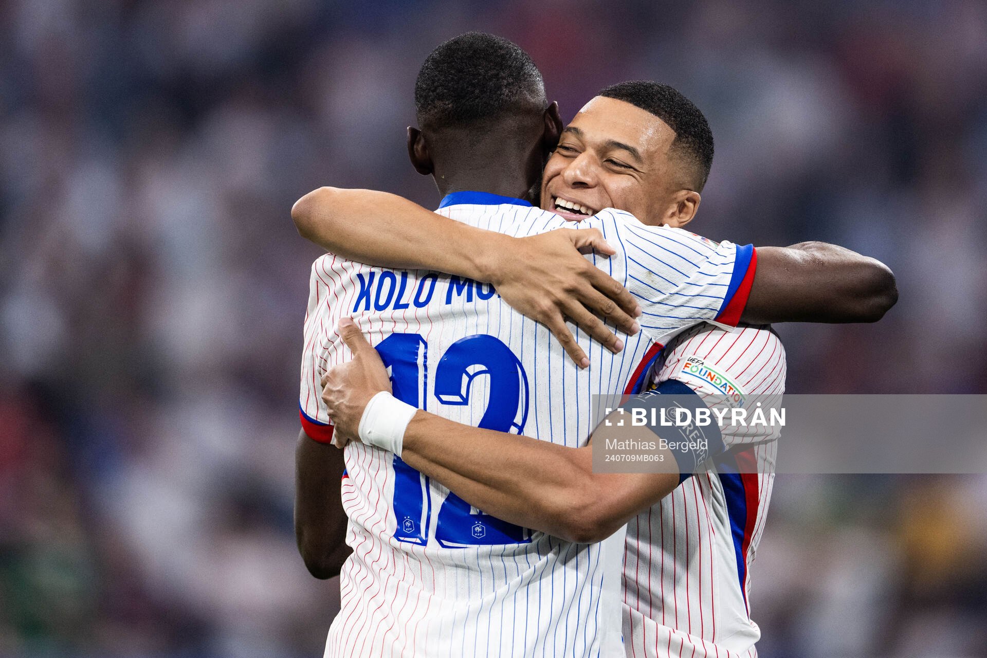 Randal Kolo Muani and Kylian Mbappé of France celebrate