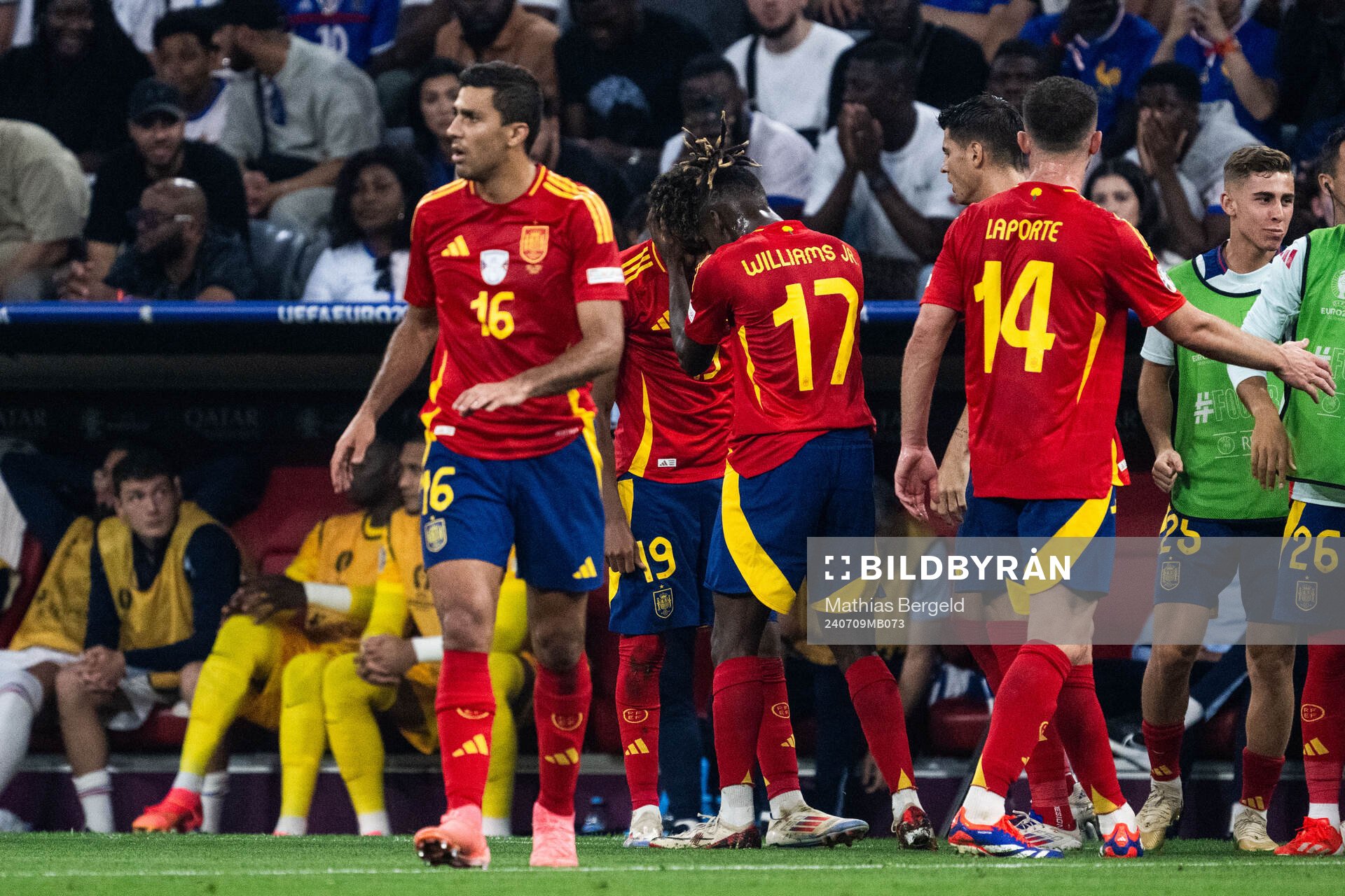 Lamine Yamal of Spain celebrates with Nicholas Williams