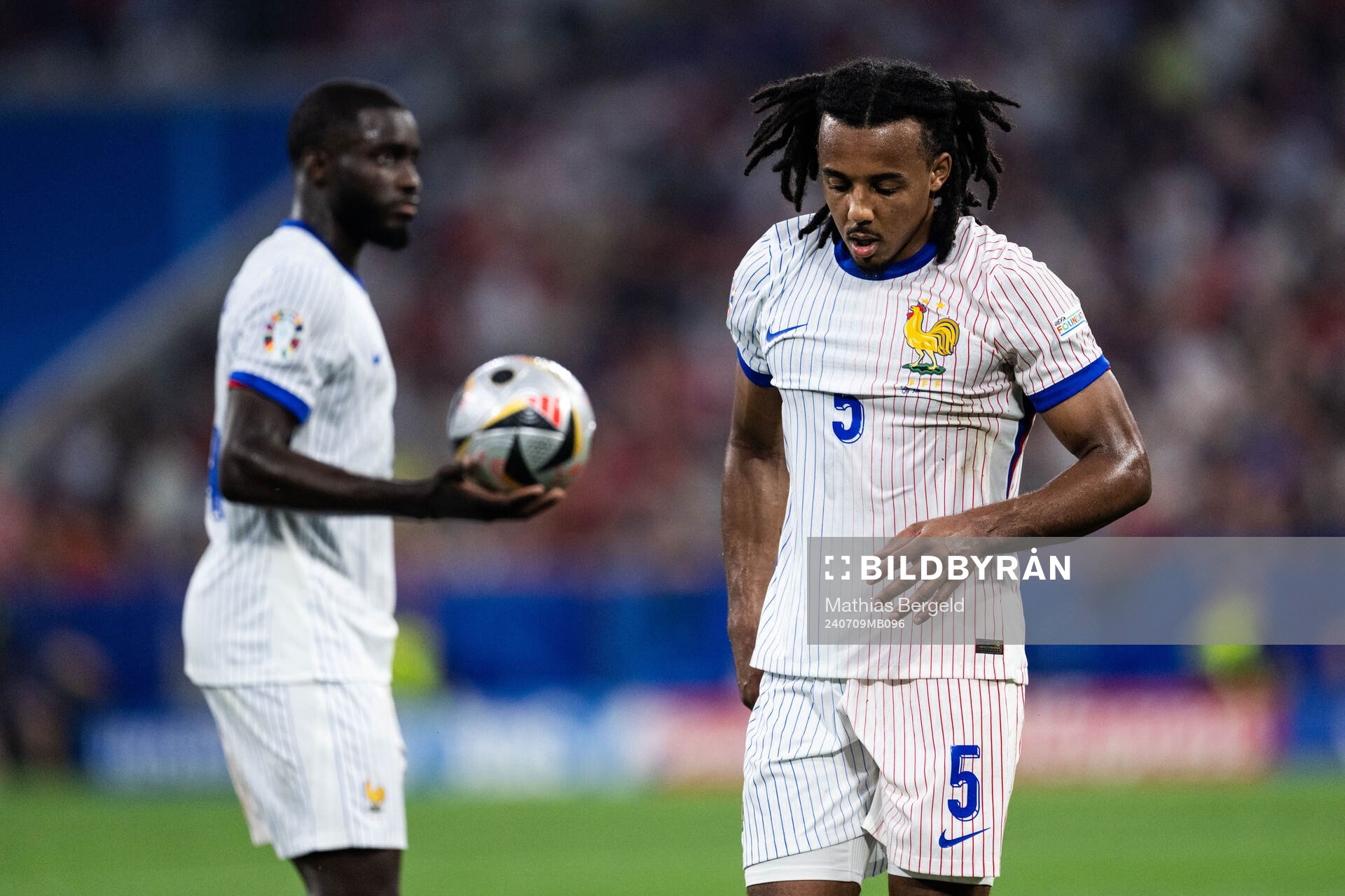 Jules Koundé of France looks dejected