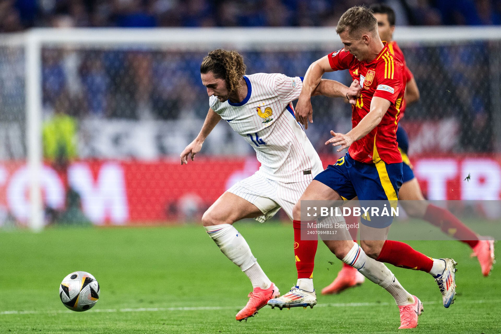 Adrien Rabiot of France and Daniel Olmo of Spain