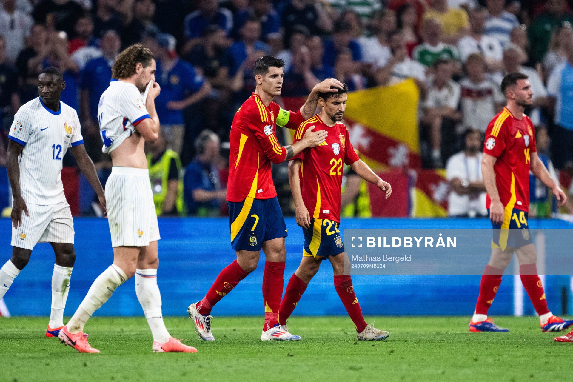Alvaro Morata and Jesus Navas of Spain look dejected