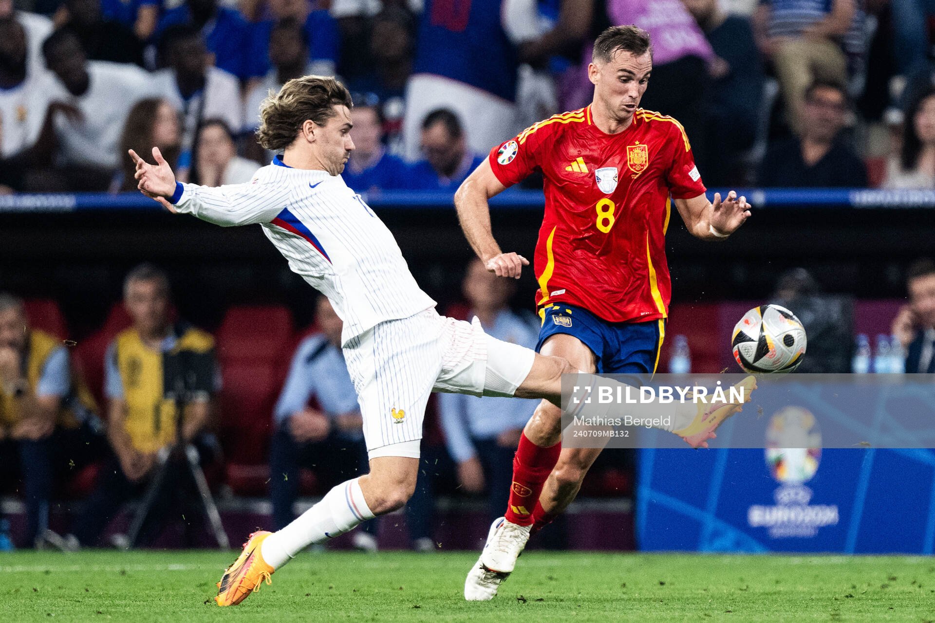 Antoine Griezmann of France and Fabian Ruiz Pena of Spain