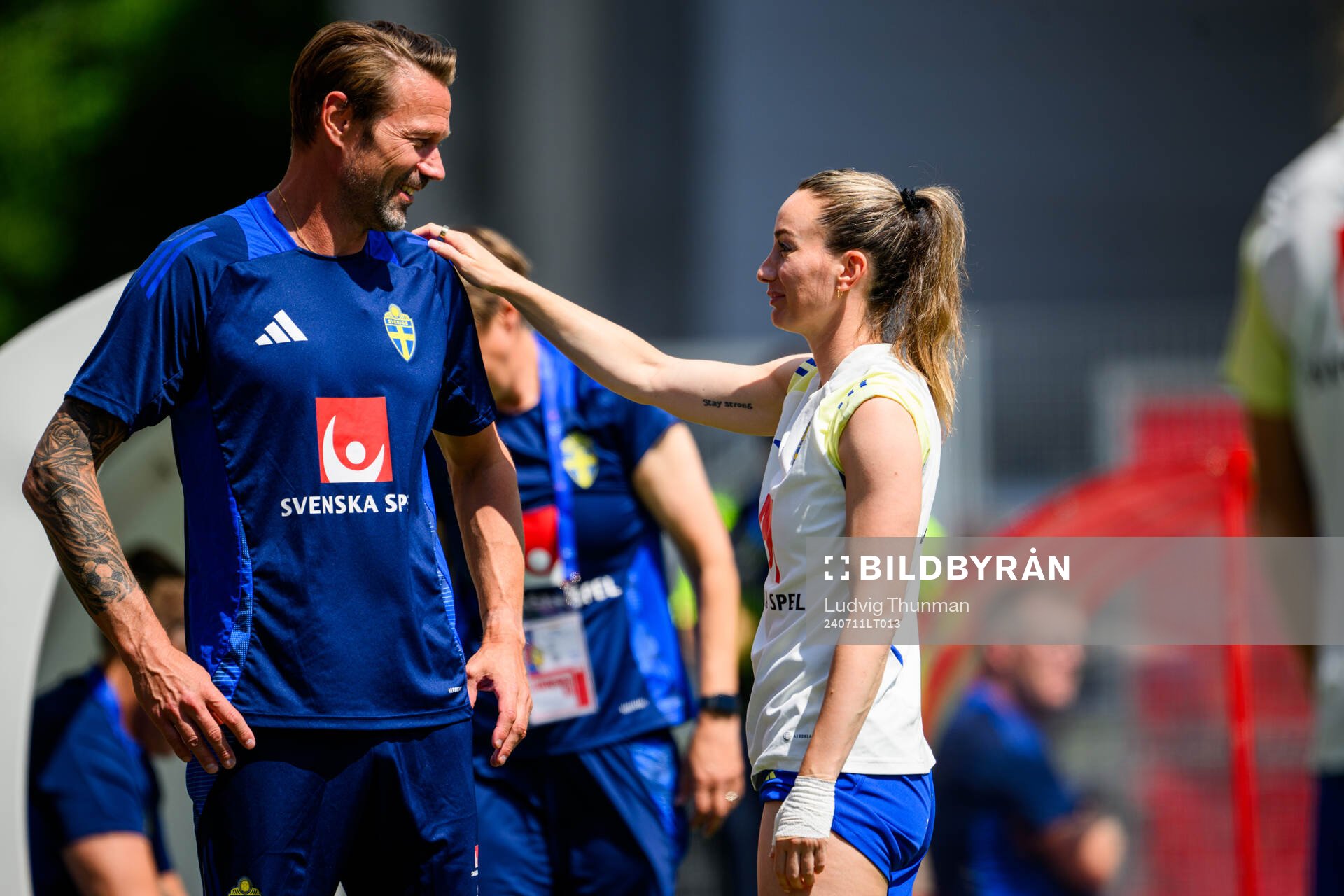 Team manager Magnus Andersson and Kosovare Asllani of the