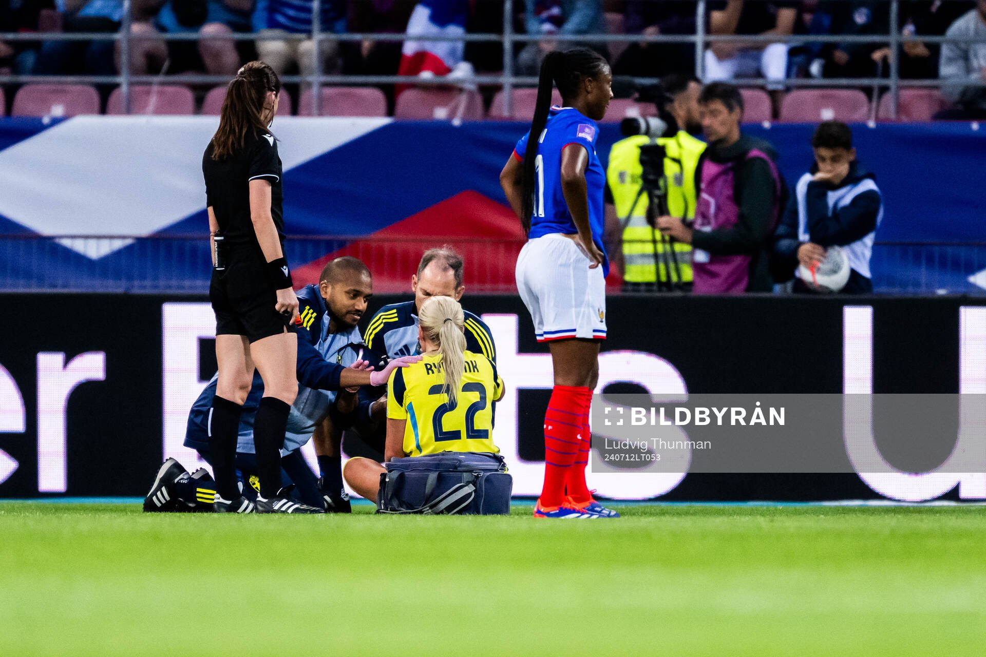Josefine Rybrink of Sweden receives care