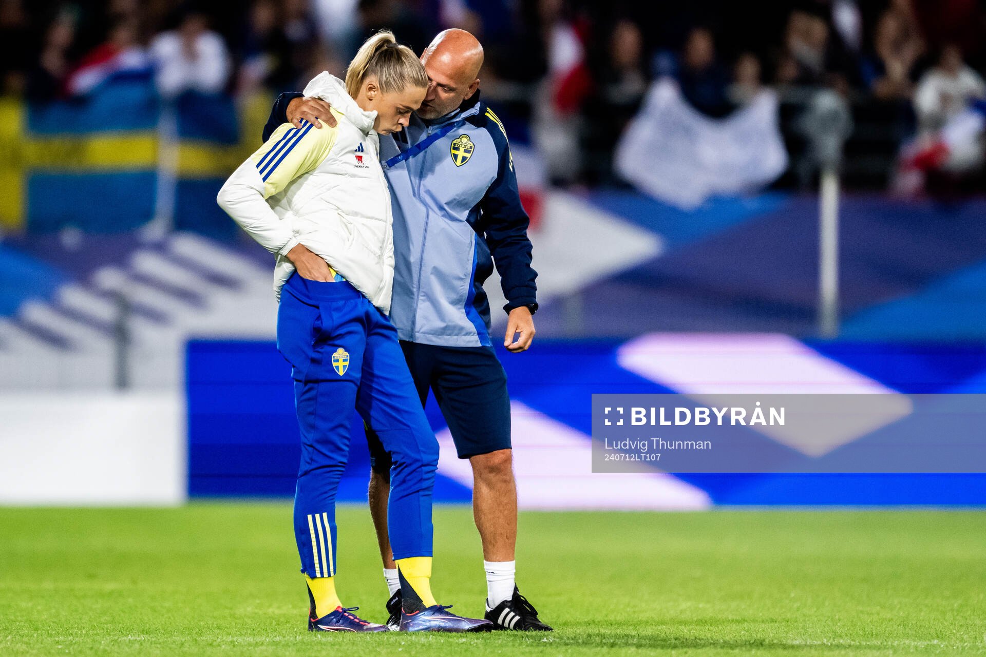 Fridolina Rolfö and assistant coach Magnus Wikman of Sweden