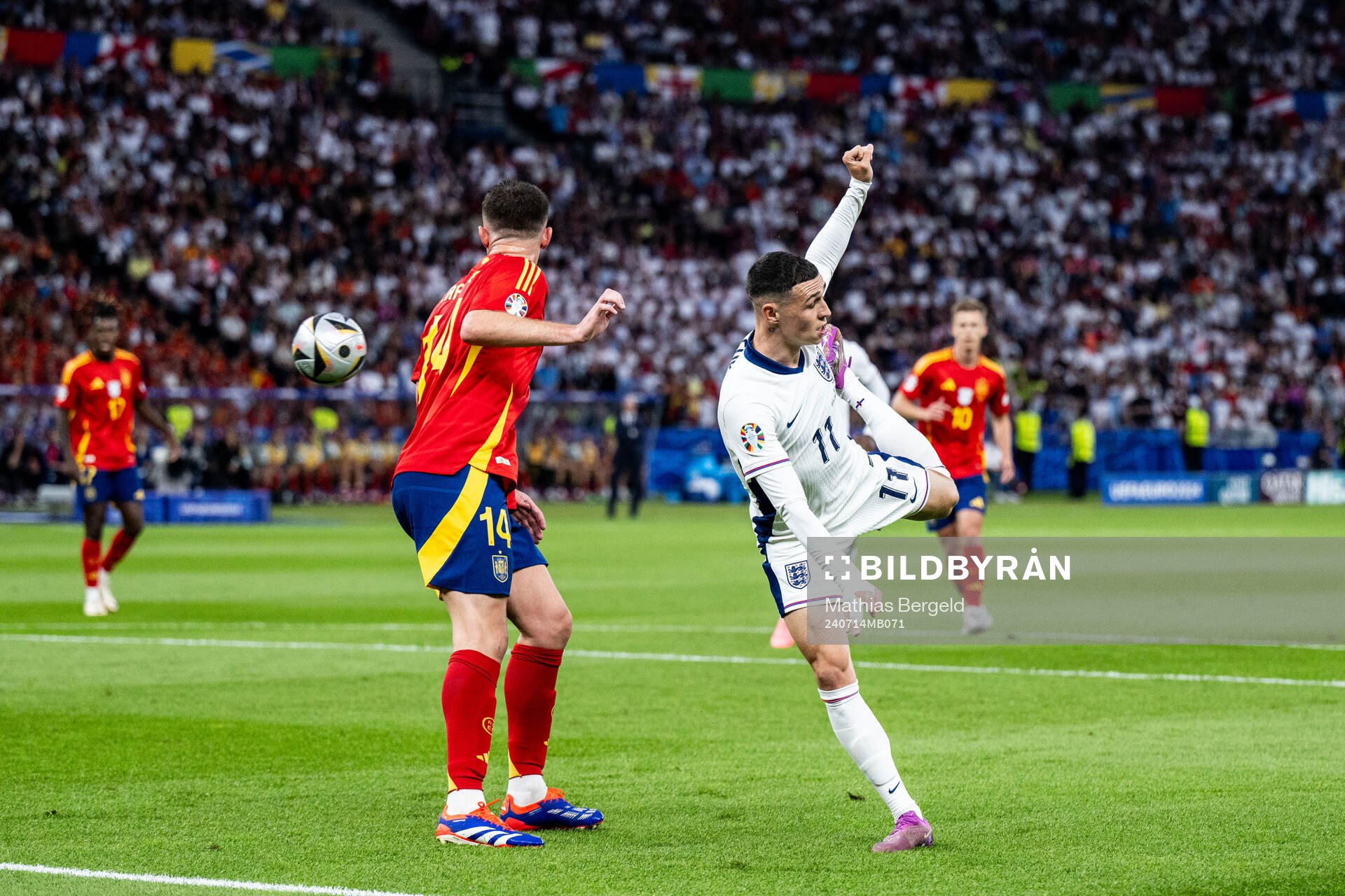 Aymeric Laporte of Spain and Phil Foden of England