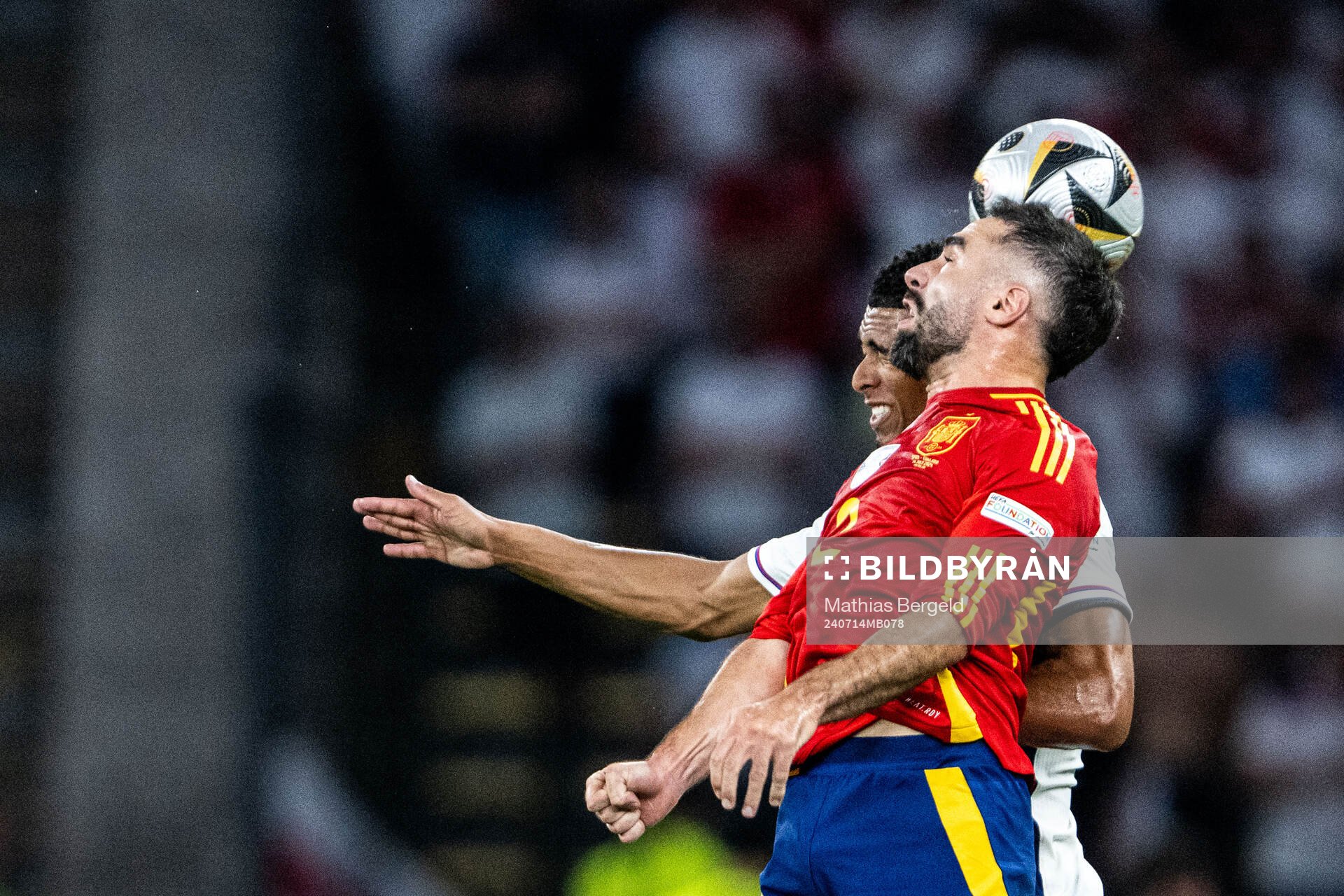 Jude Bellingham of England and Daniel Carvajal of Spain