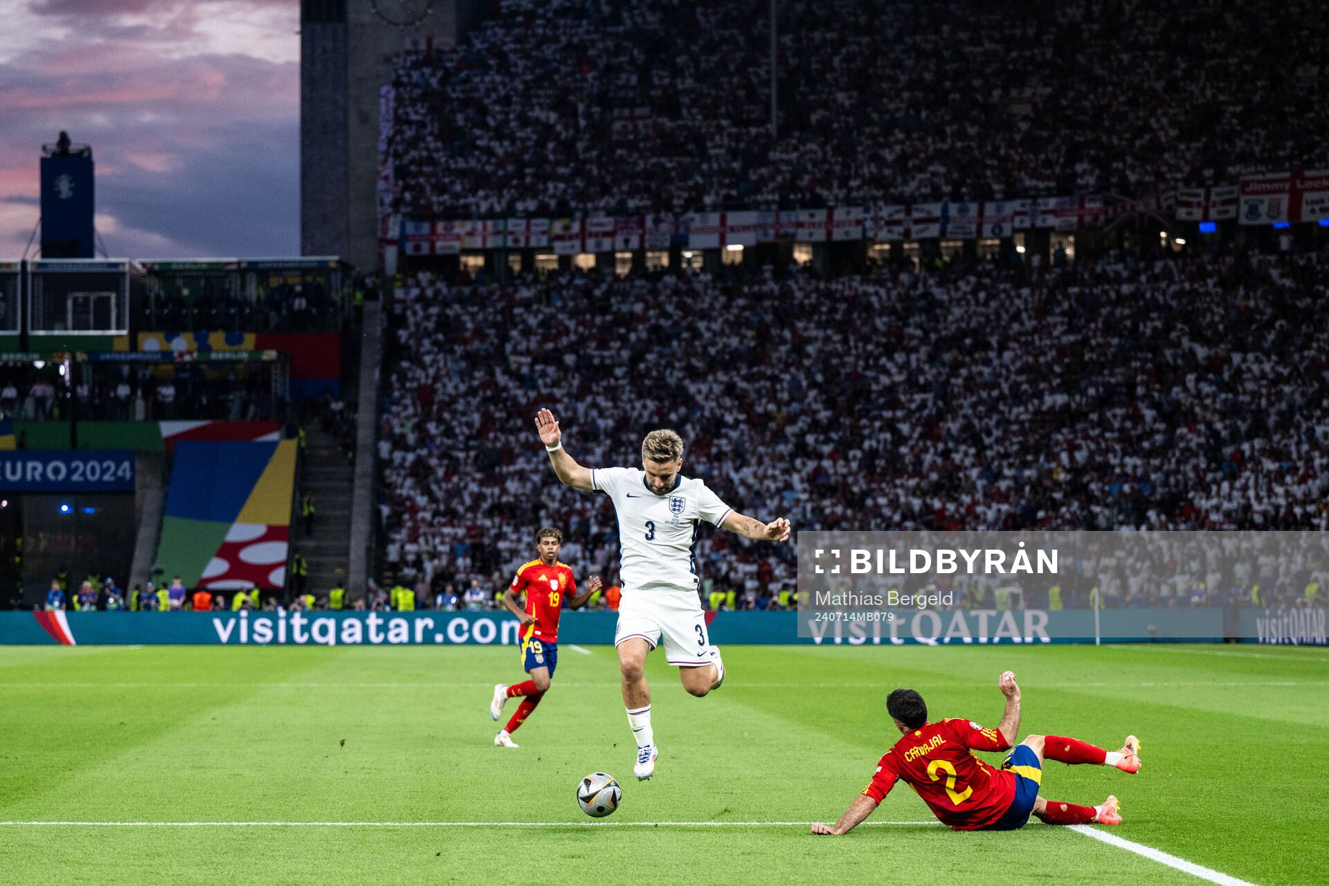 Luke Shaw of England and Daniel Carvajal of Spain