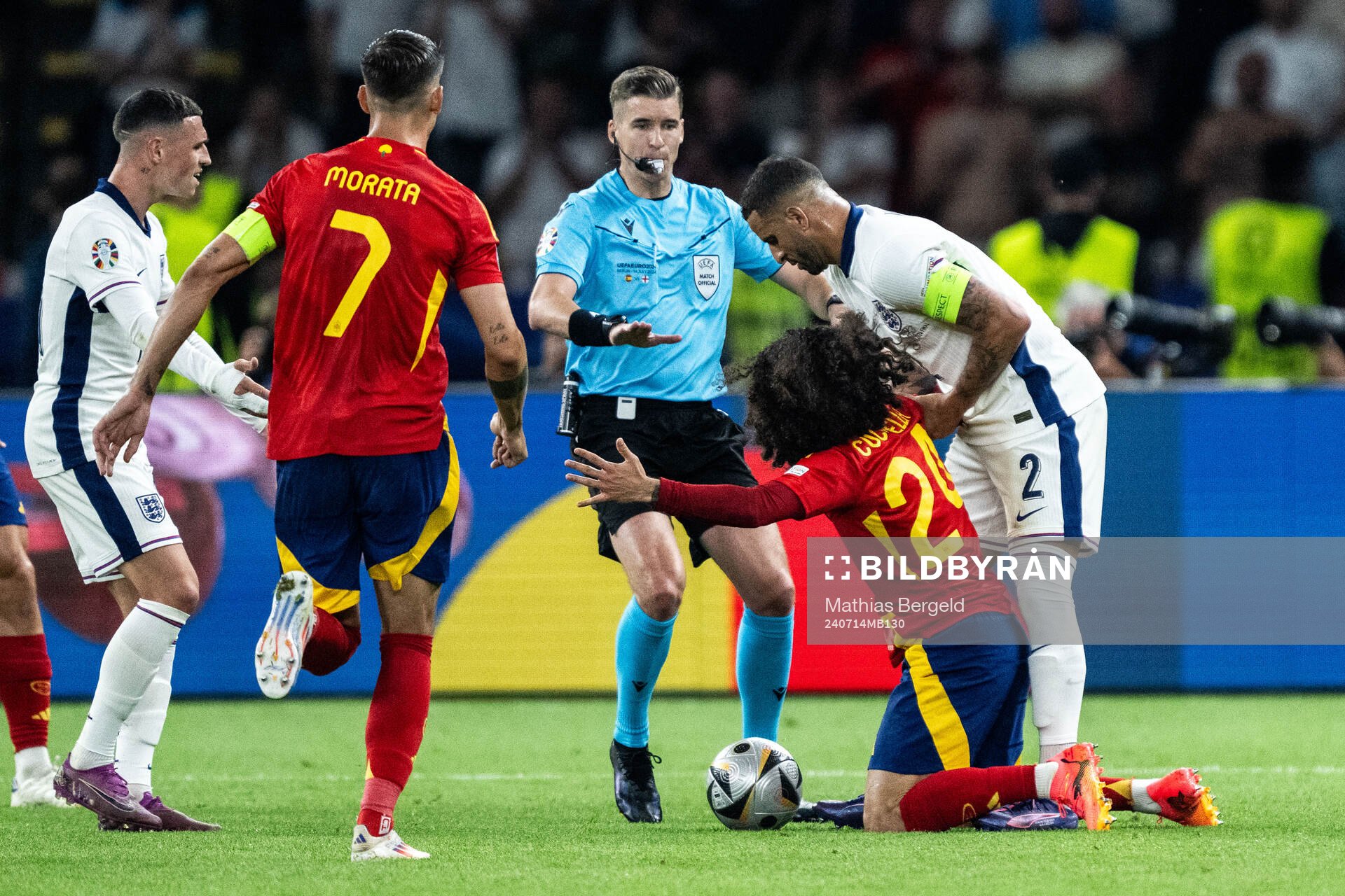 Referee Francois Letexier against Marc Cucurella of Spain