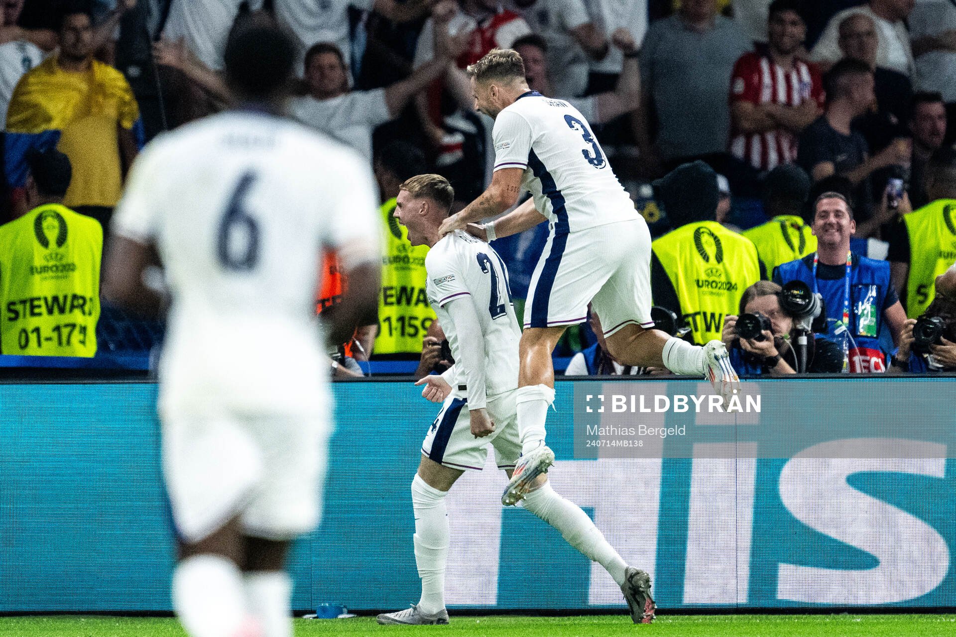 Cole Palmer and Luke Shaw of England celebrate after 1-1 during the UEFA Euro 2024 Football Championship final between Spain and England on July 14, 2024 in Berlin.