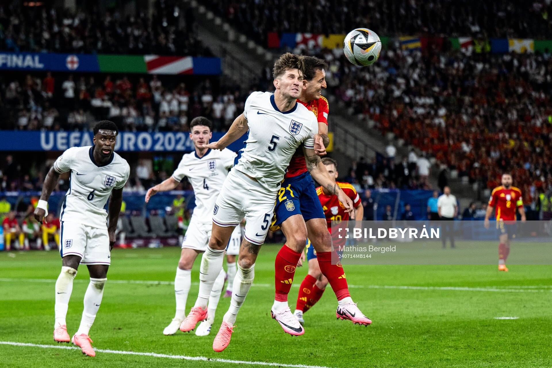 John Stones of England and Mikel Oyarzabal of Spain