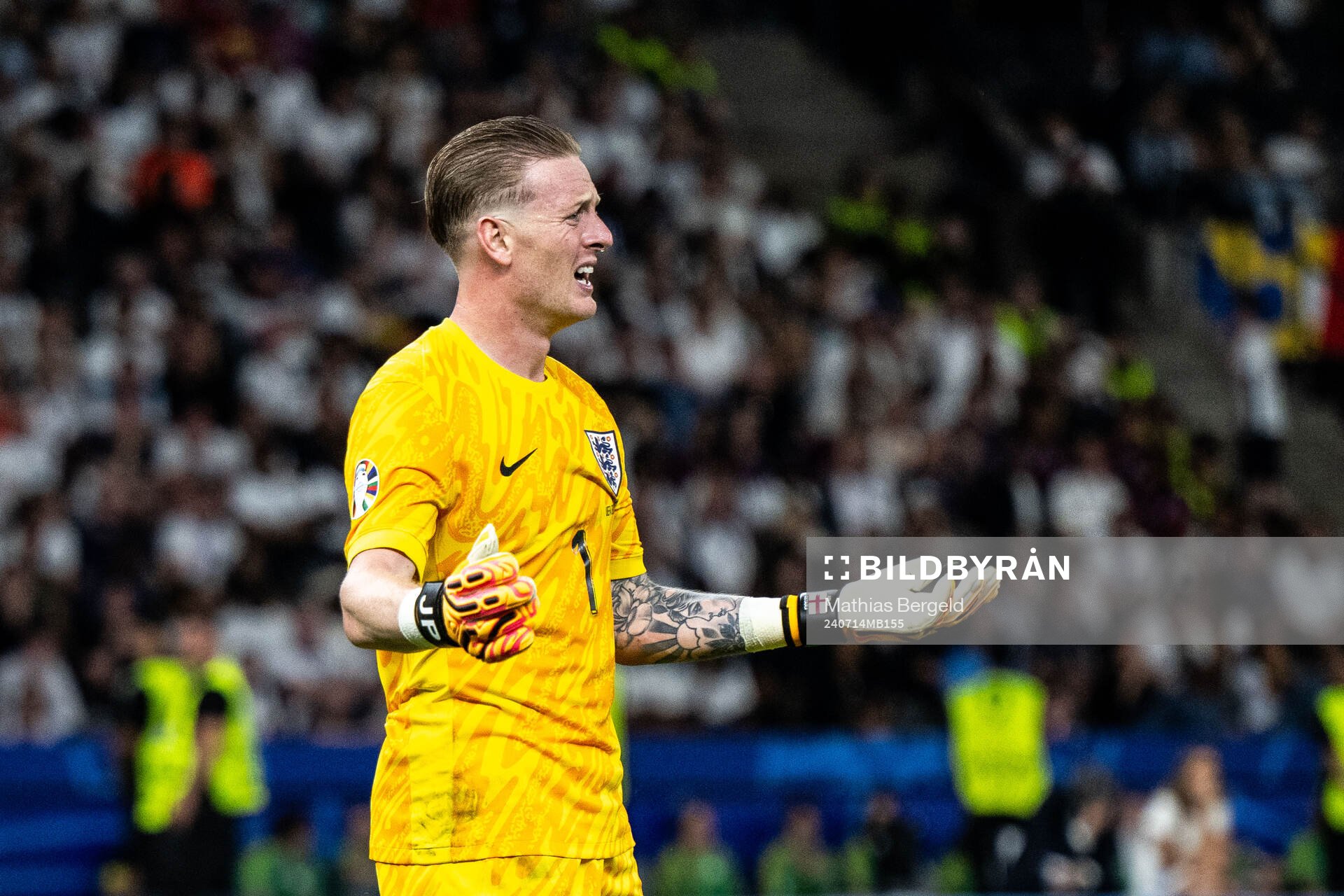 Goalkeeper Jordan Pickford of England looks dejected