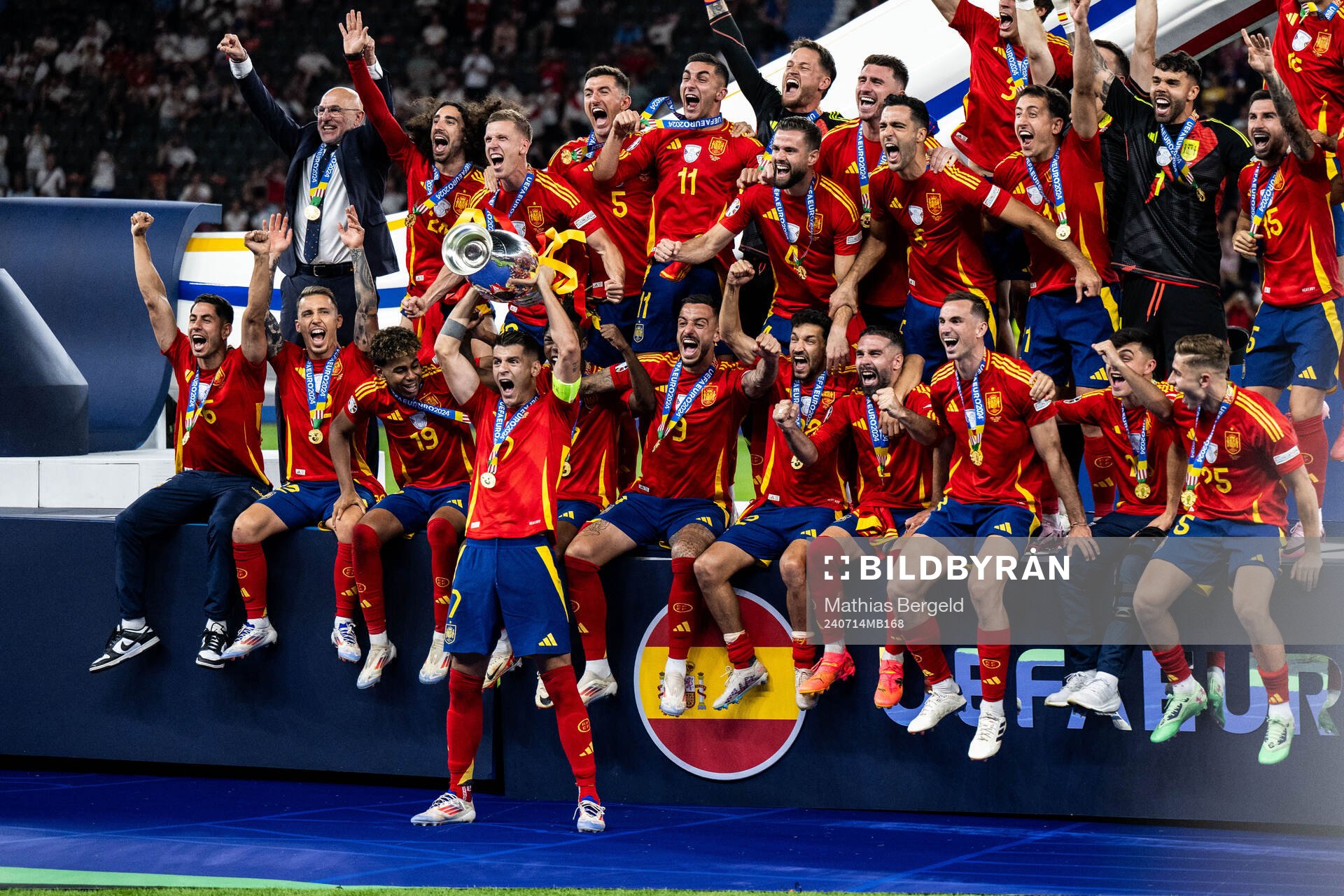 Alvaro Morata of Spain celebrates with team mates and the