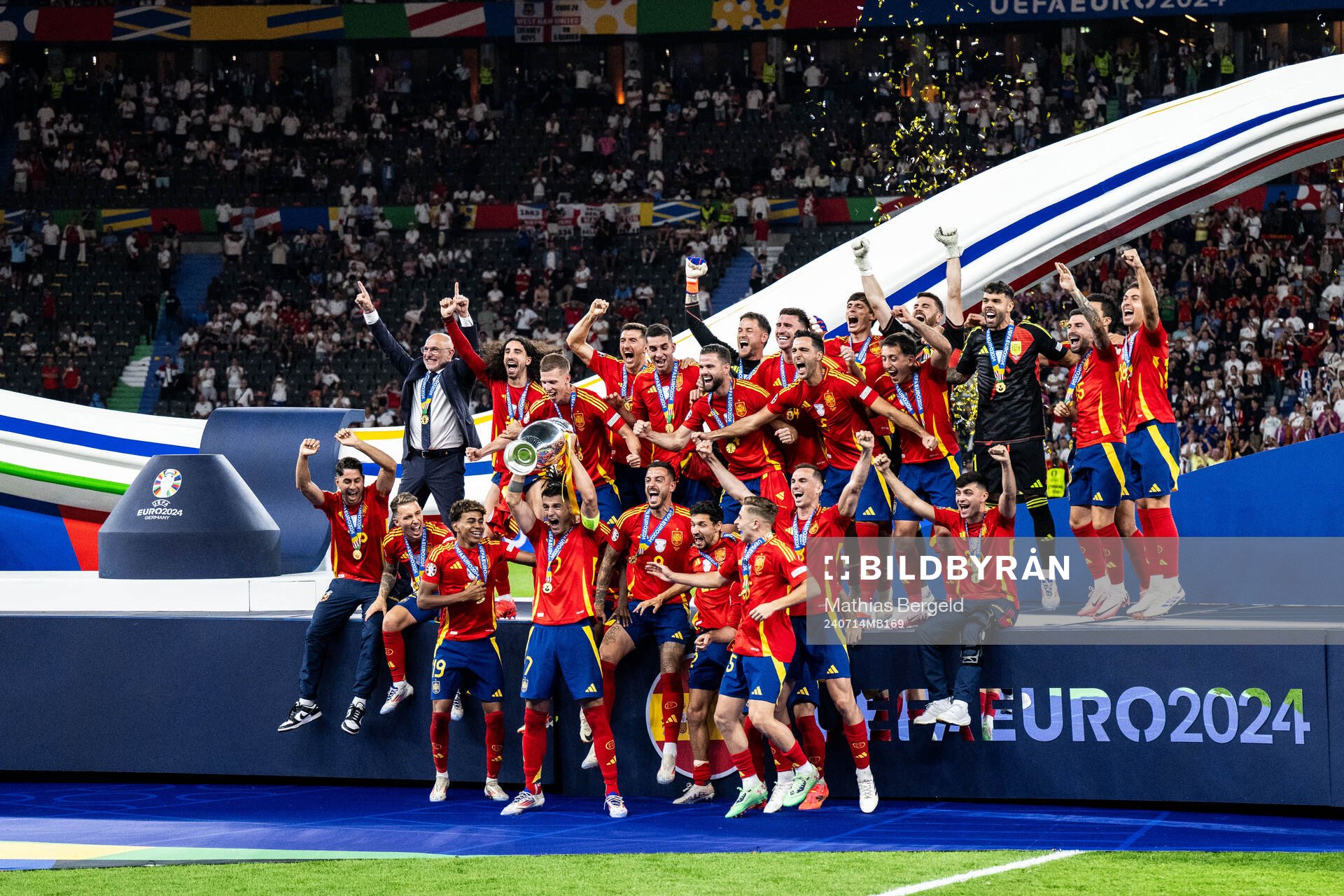 Alvaro Morata of Spain celebrates with team mates and the