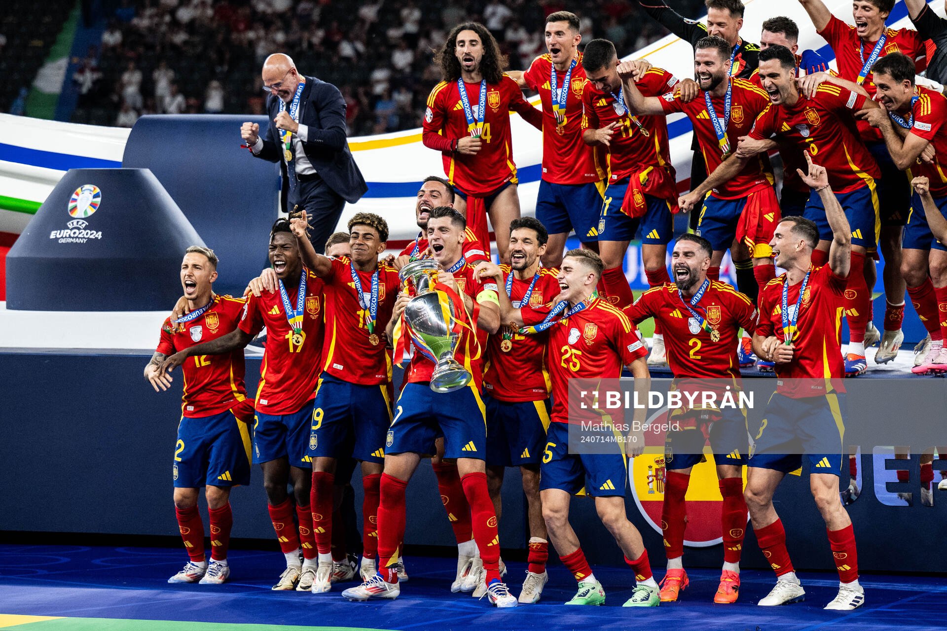 Alvaro Morata of Spain celebrates with team mates and the