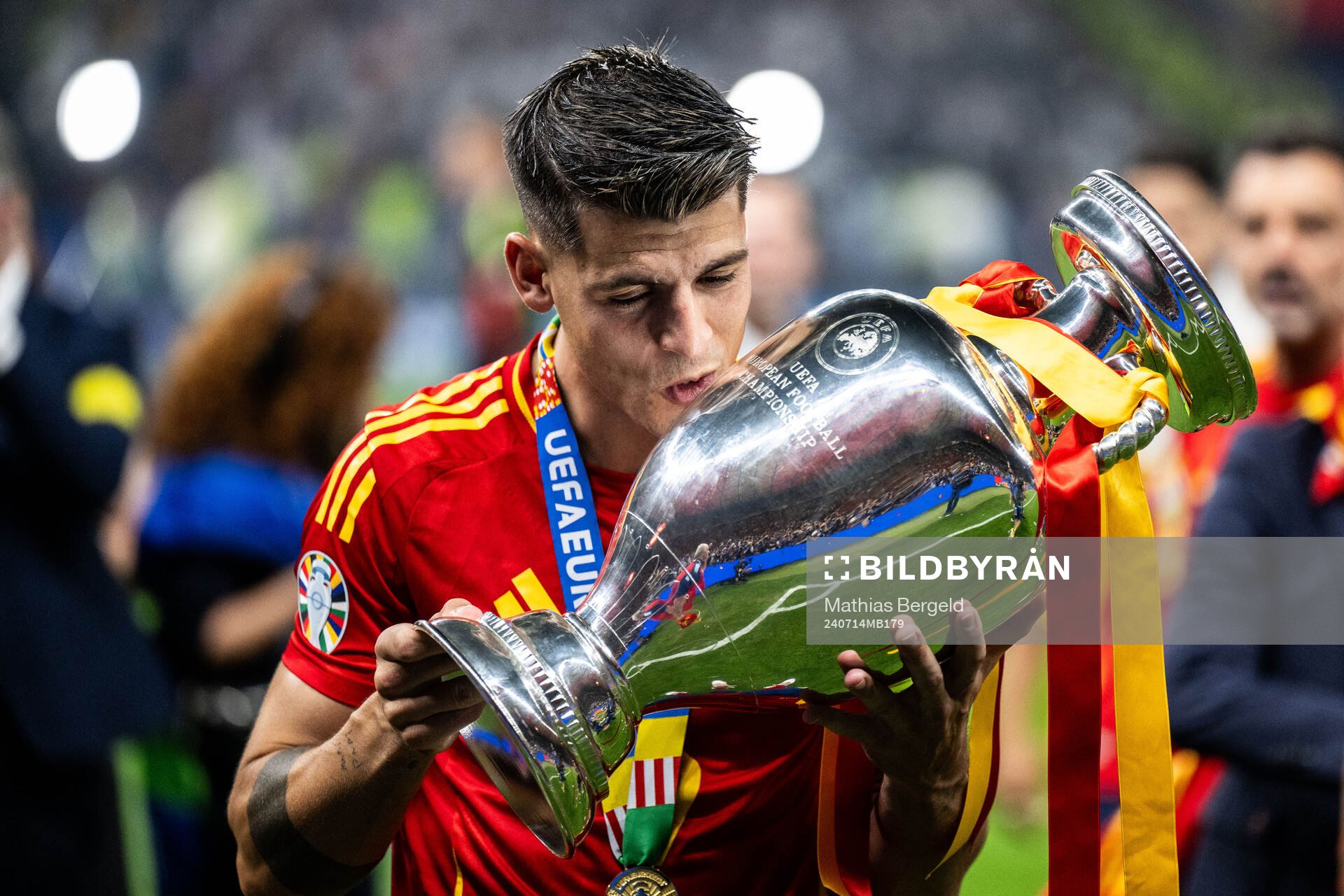 Alvaro Morata of Spain celebrates with the trophy