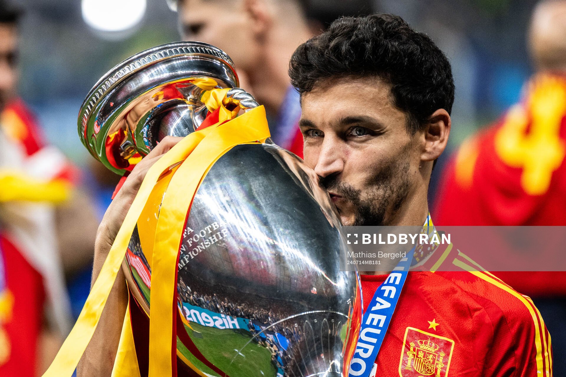 Jesus Navas of Spain celebrates with the trophy
