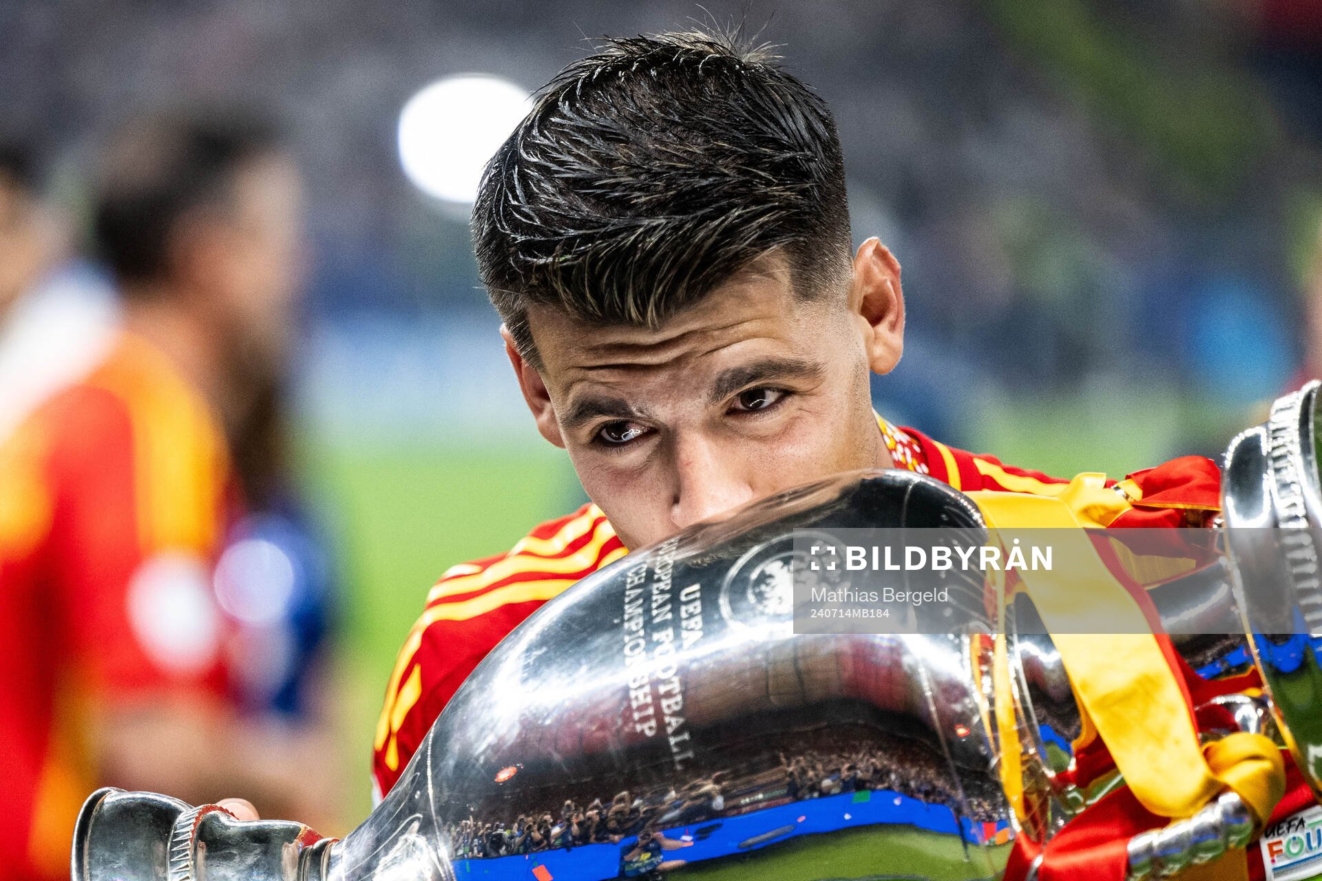 Alvaro Morata of Spain celebrates with the trophy