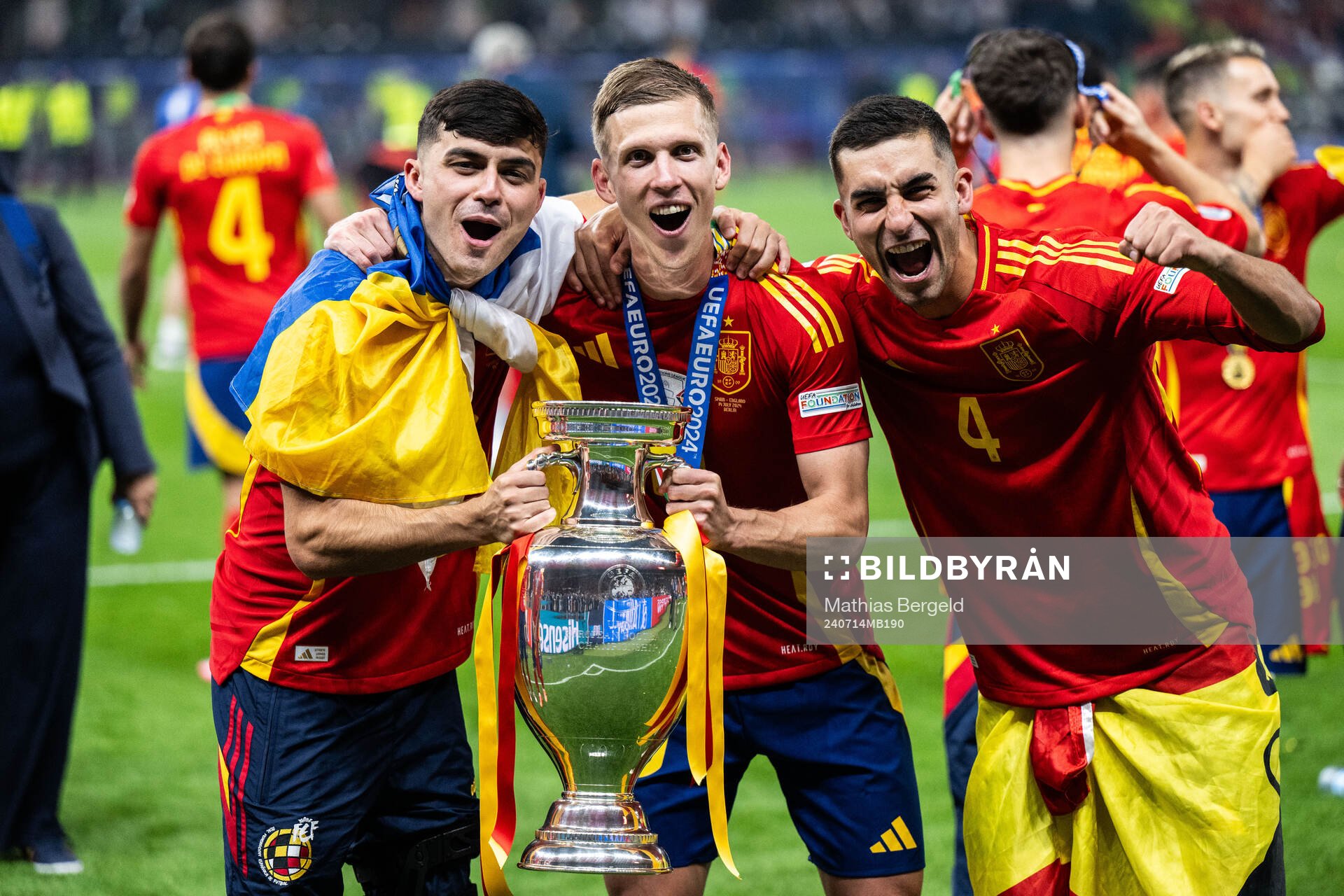 Pedri and Daniel Olmo of Spain celebrates with the trophy