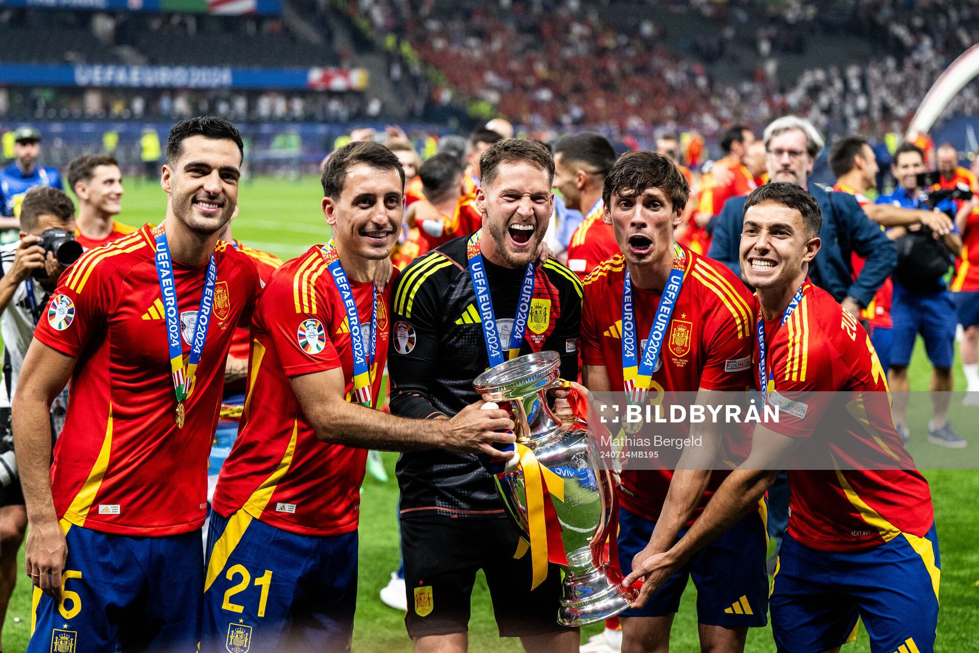 Mikel Merino, Mikel Oyarzabal, goalkeeper Alejandro Remiro, Robin Aime Le Normand Mainfray of Spain celebrate with the trophy after the UEFA Euro 2024 Football Championship final between Spain and England on July 14, 2024 in Berlin.