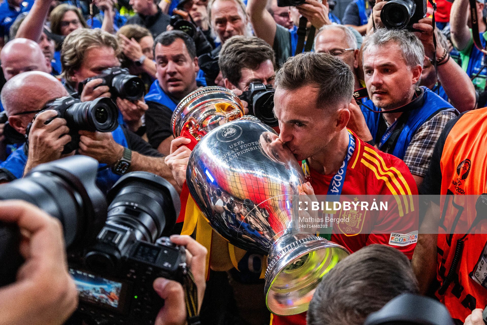 Fabian Ruiz Pena of Spain celebrates with the trophy