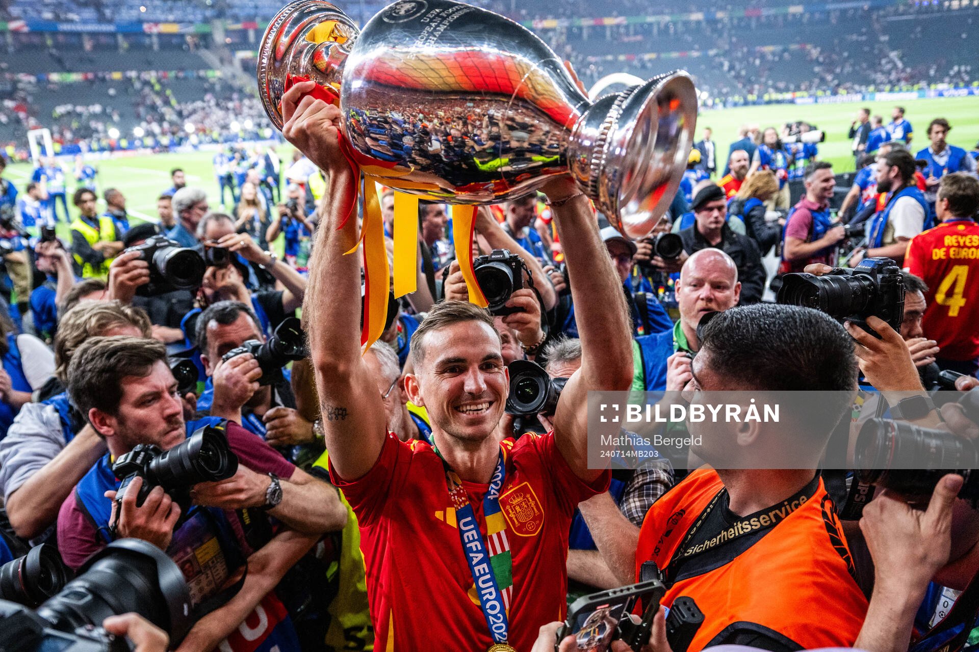 Fabian Ruiz Pena of Spain celebrates with the trophy
