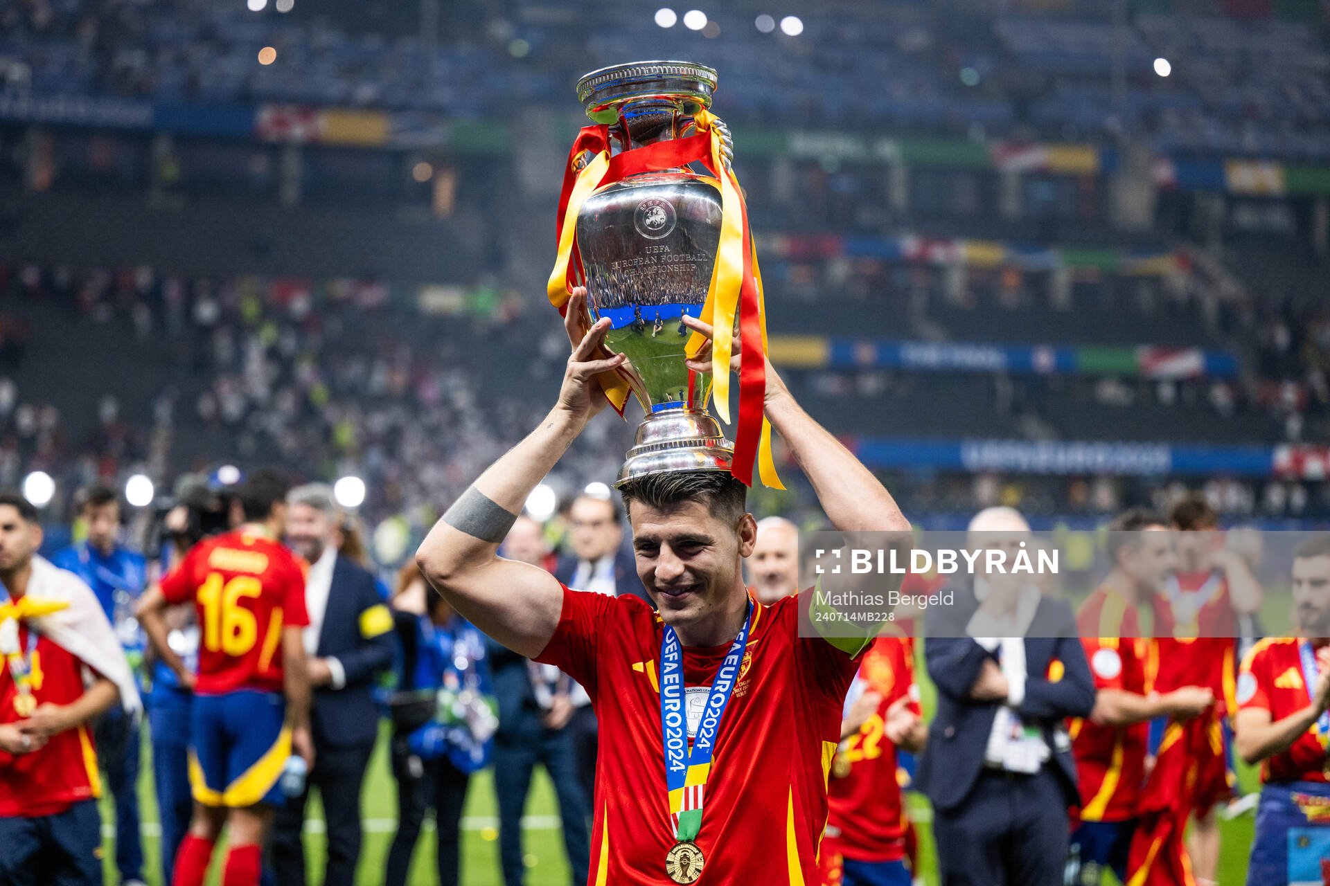 Alvaro Morata of Spain celebrates with the trophy