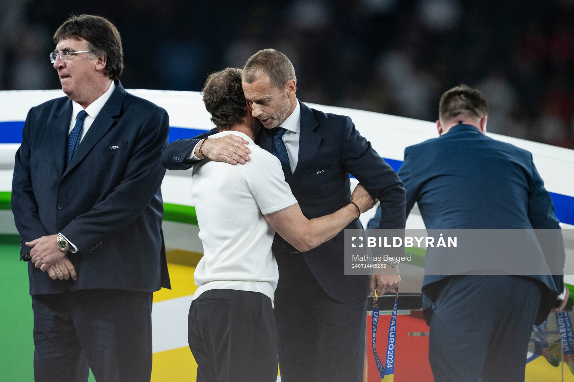 Head coach Gareth Southgate of England hugs Aleksander