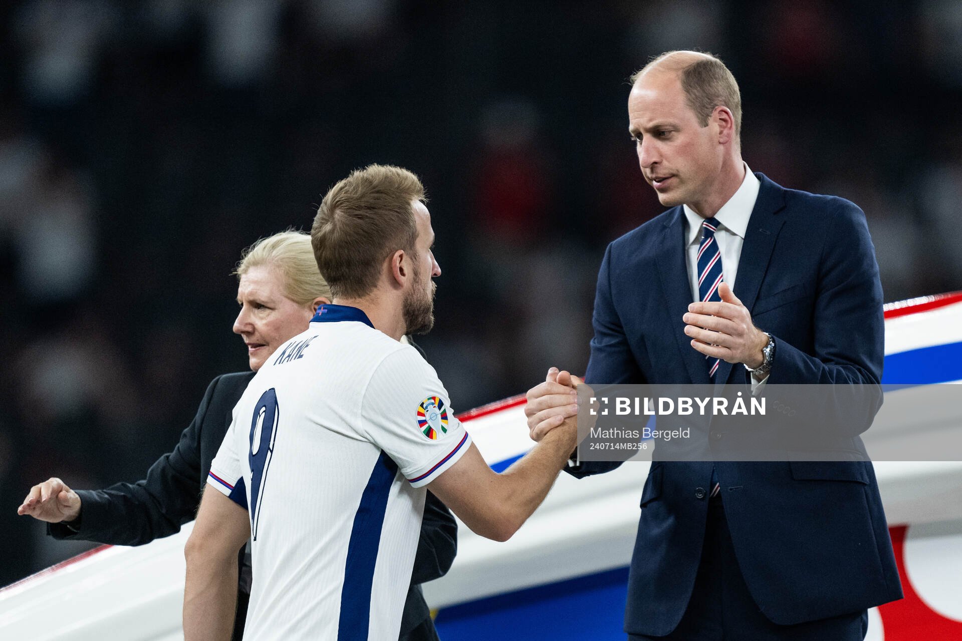 Prince William of Great Britain greets Harry Kane of England during the medal ceremony after the UEFA Euro 2024 Football Championship final between Spain and England on July 14, 2024 in Berlin. 