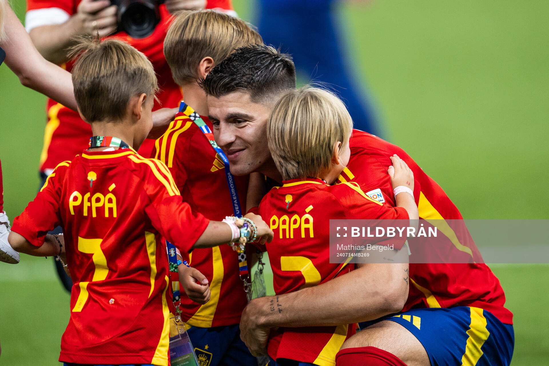Alvaro Morata of Spain celebrates with his children