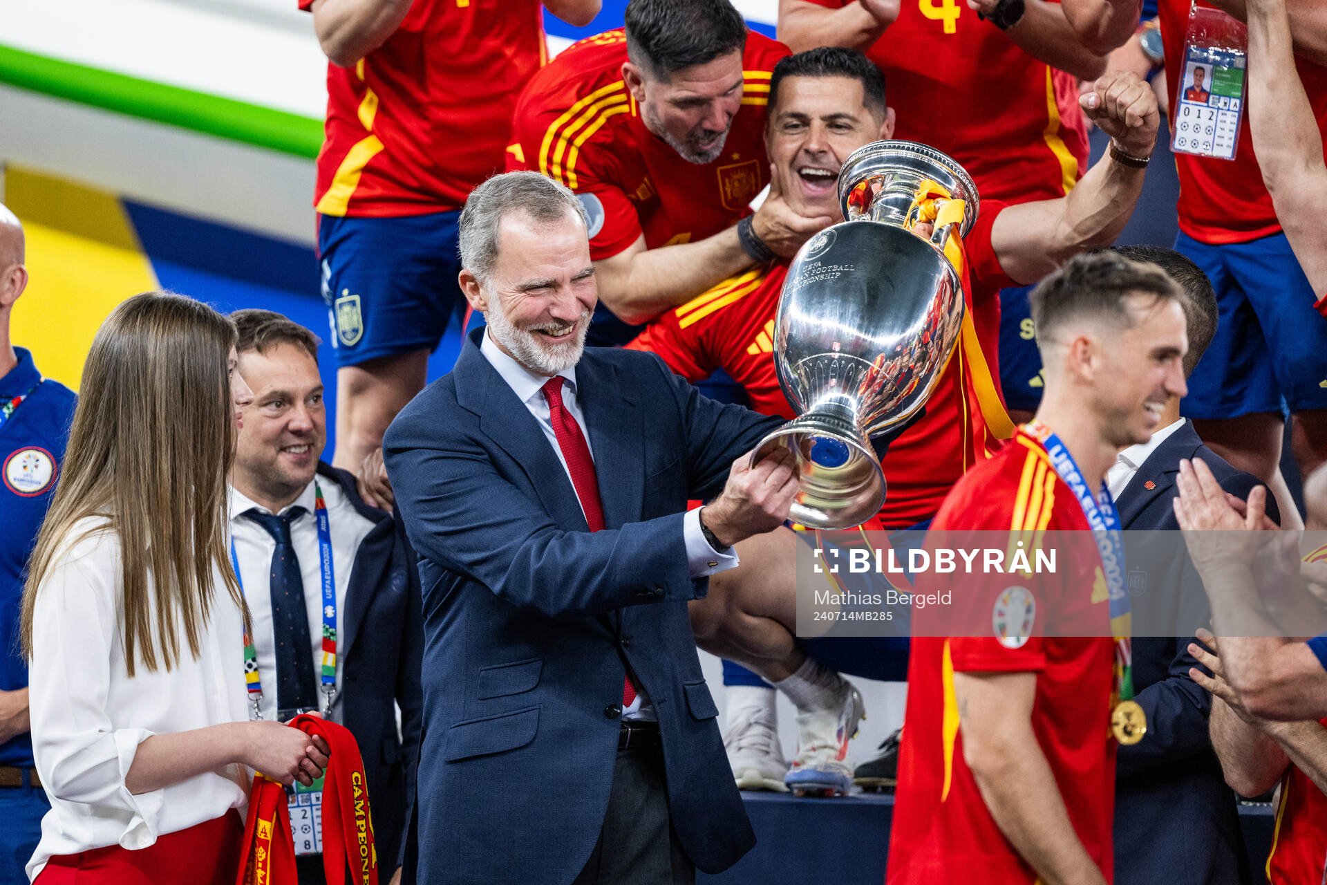King Felipe VI of Spain celebrates with the trophy