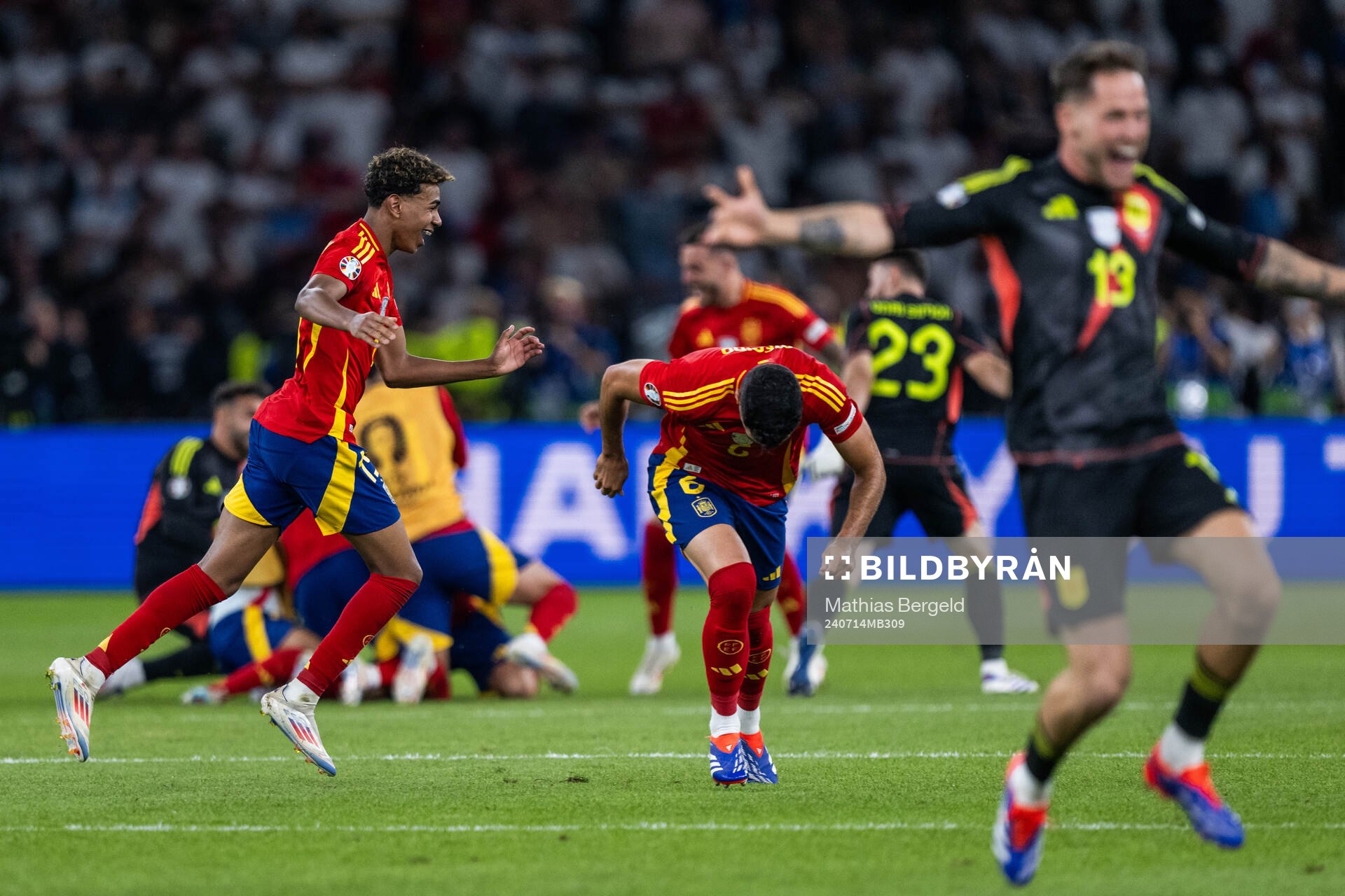 Lamine Yamal of Spain celebrates with team mates