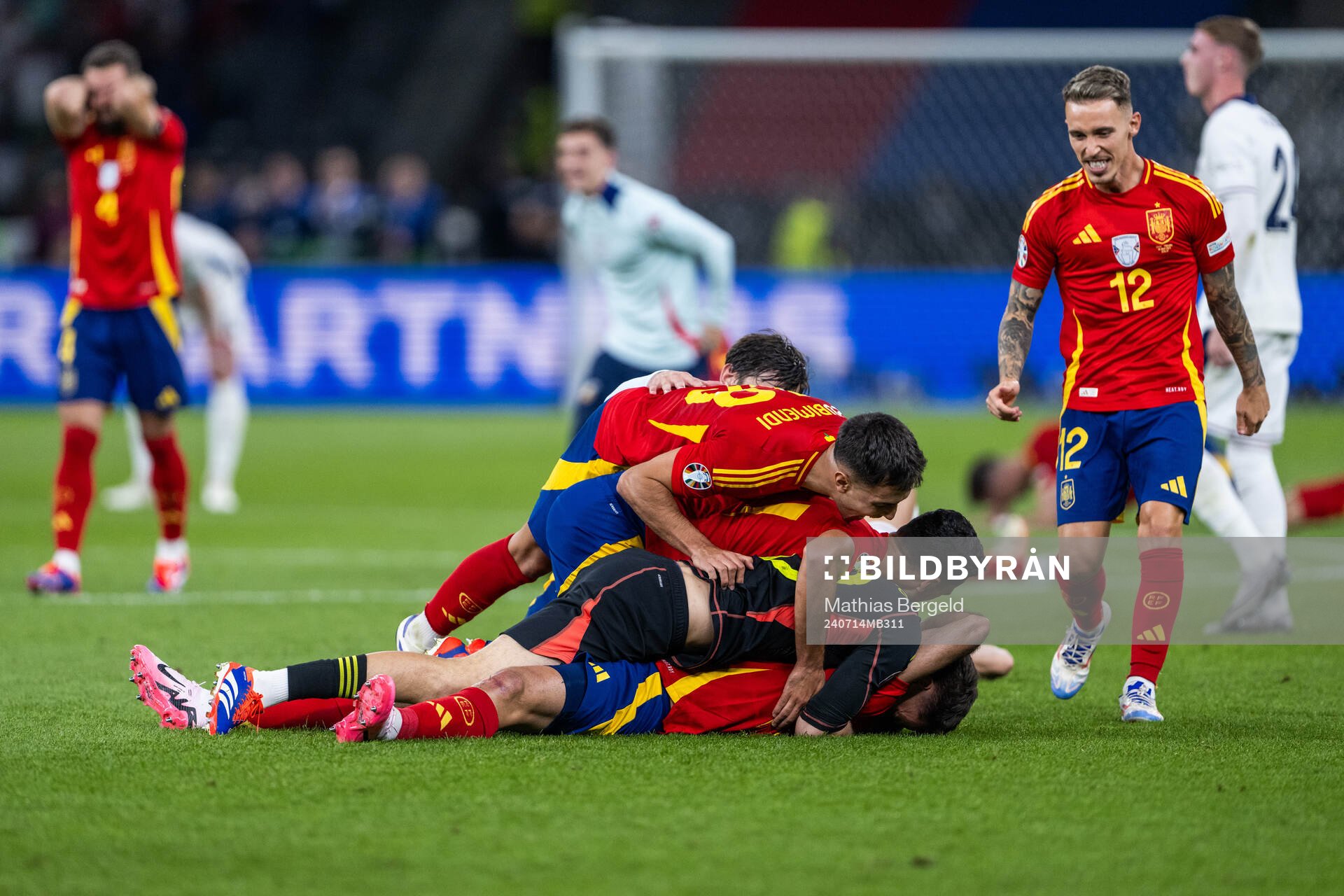 Martin Zubimendi and Alejandro Grimaldo of Spain celebrate
